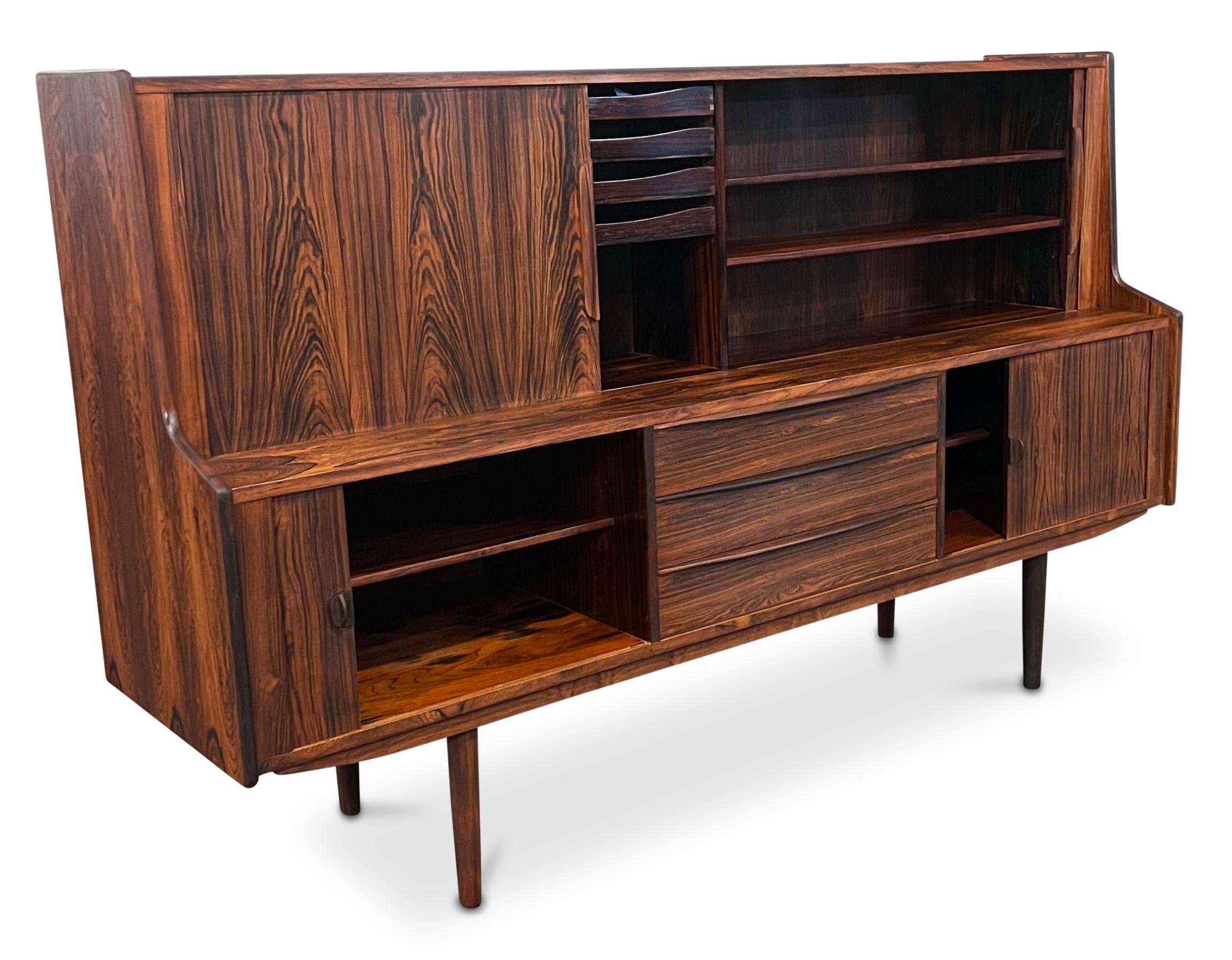 Very rare design Credenza in rosewood by Ib Kofod Larsen for Faarup Mobelfabrik

Brazilian rosewood have been illegal to harvest since 1961 and on the U.N. CITES list of endangered spices since 1992. For each piece of rosewood furniture we import to