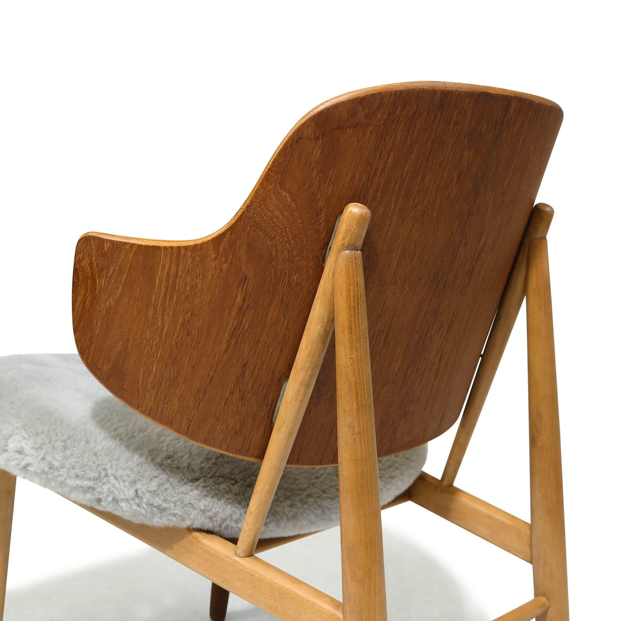Sheepskin Ib Kofod Larsen Teak and Beech Lounge Chair For Sale