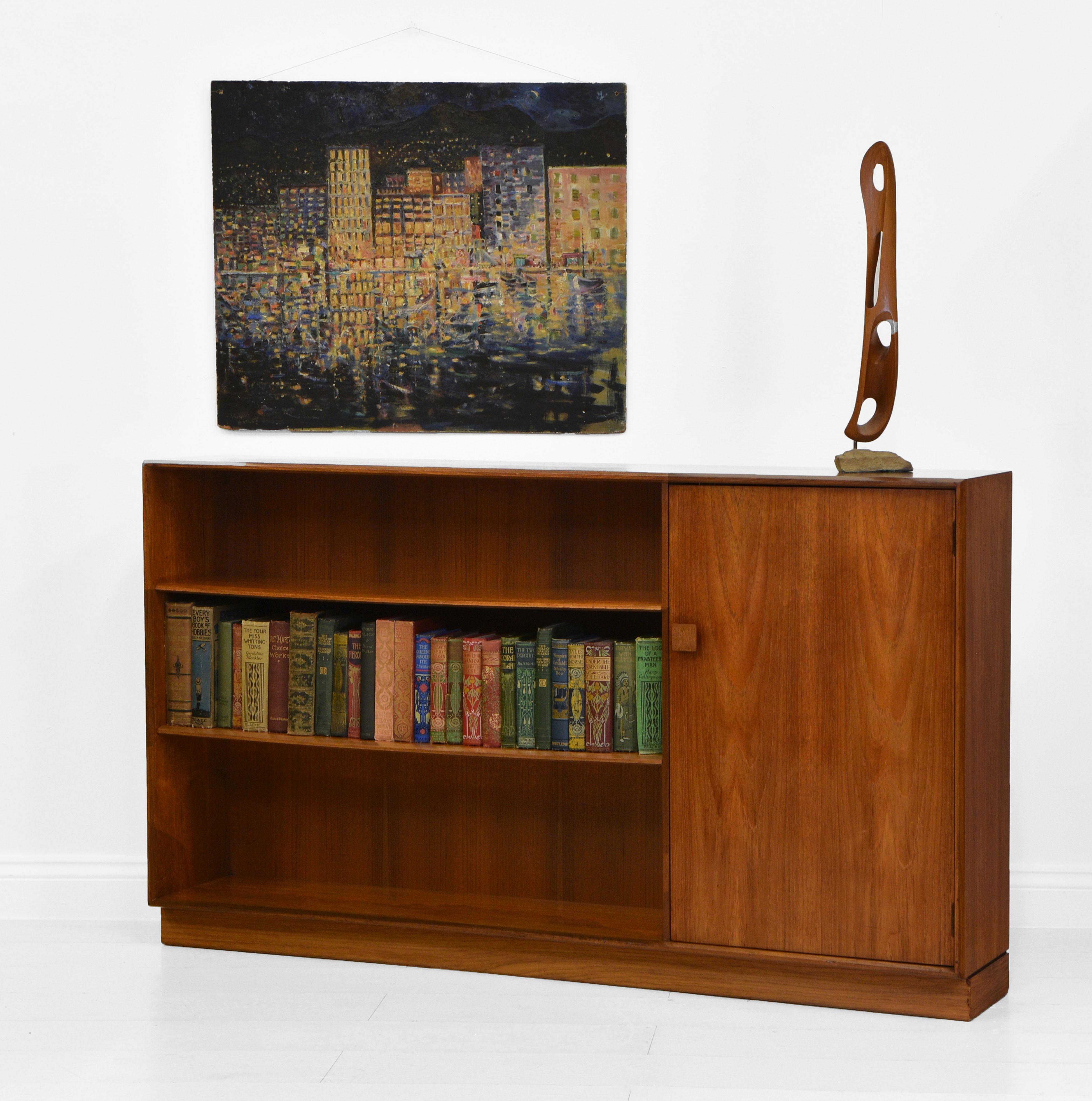 Mid Century teak open bookcase designed by Ib Kofod-Larsen for G-Plan. Circa early 1960's. 

Danish-born architect and furniture designer Ib Kofod-Larsen (1921–2003) earned his architecture degree from the Royal Danish Academy in Copenhagen,