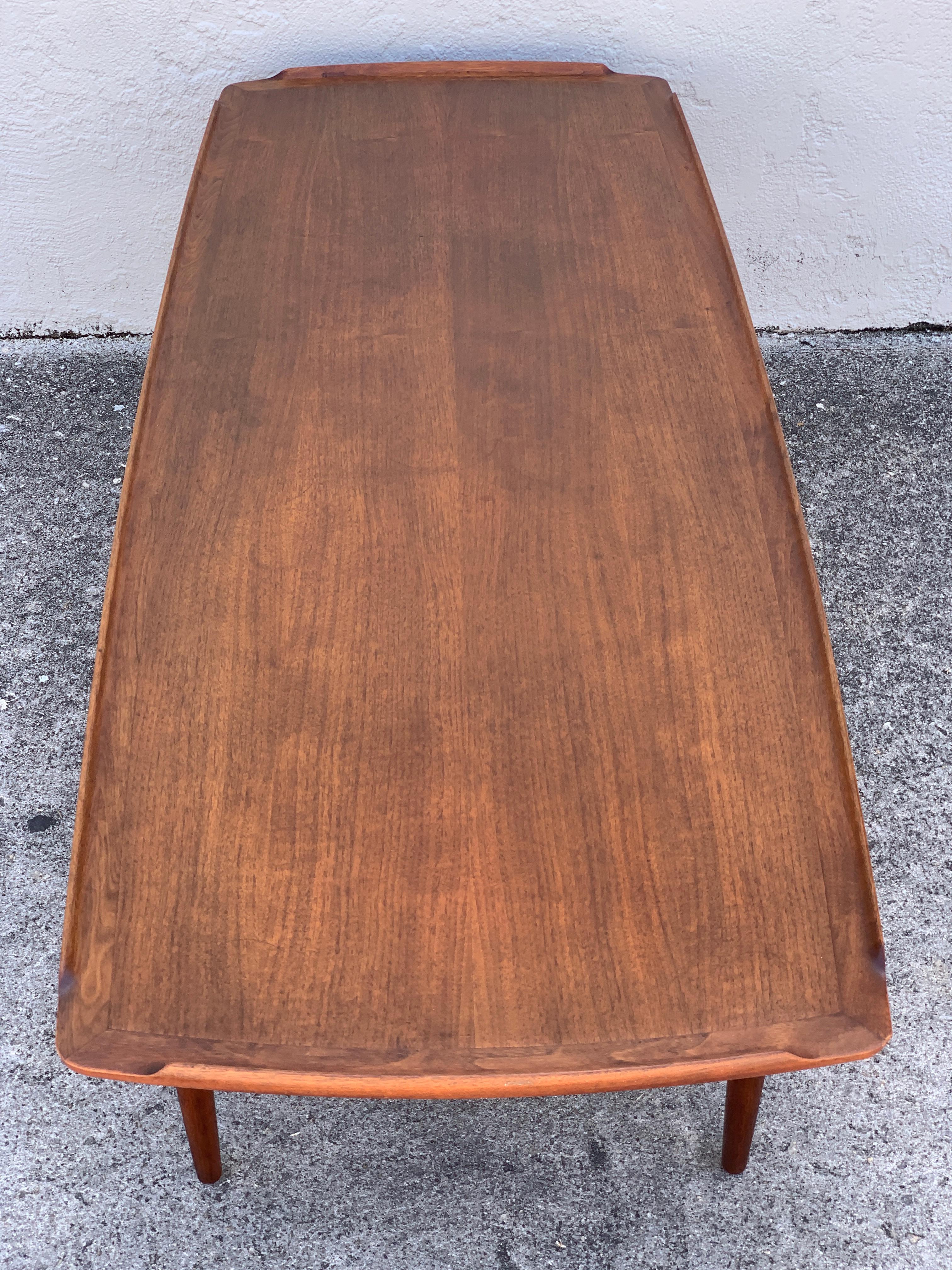 20th Century Ib-Kofod Larsen, Two-Tier Teak Surfboard Coffee Table with Caned Shelf