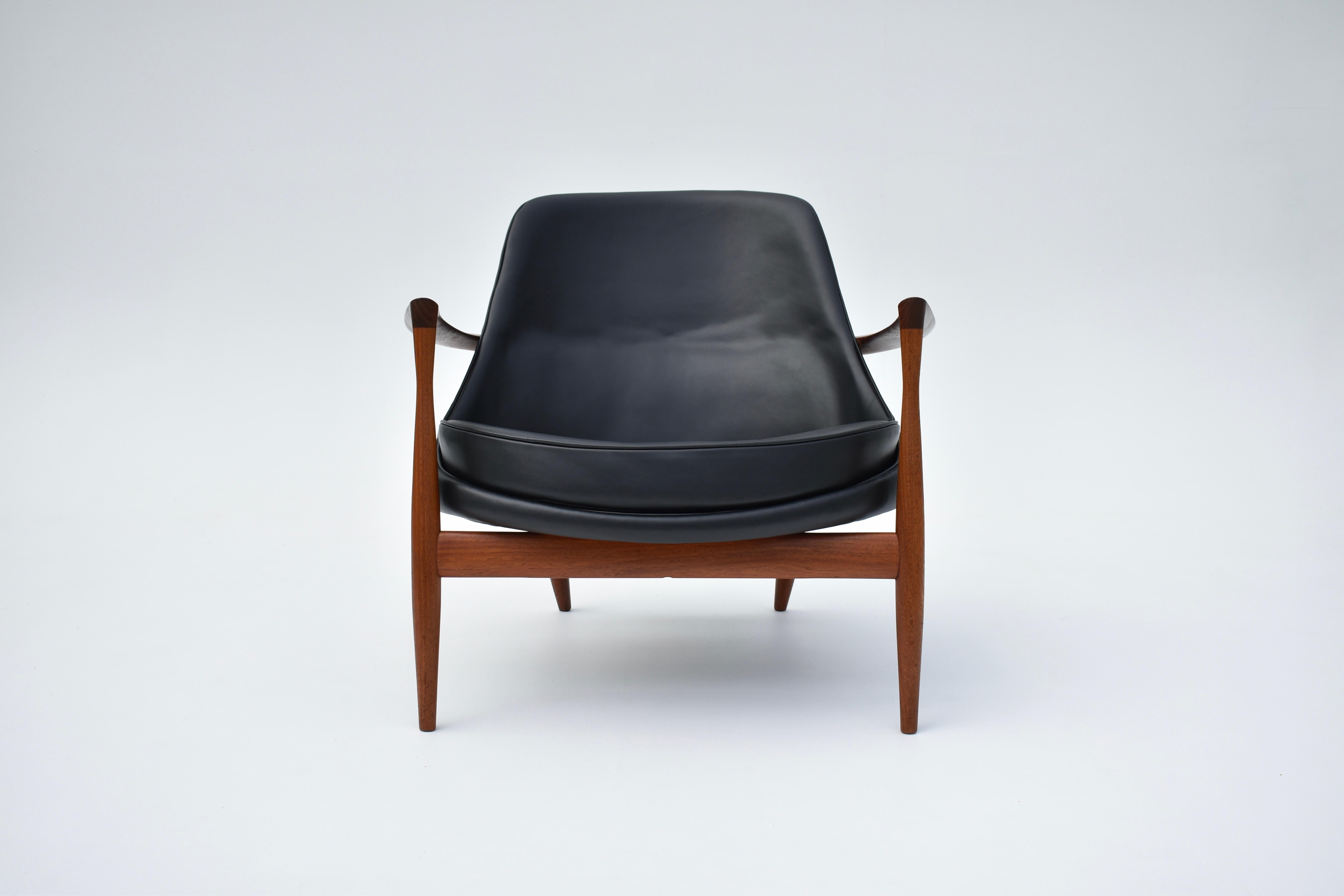 Incredibly rare and exquisitely crafted Model U-56 Elizabeth chair designed in 1956 by Ib Kofod-Larsen for cabinet makers Christensen & Larsen.

Later nicknamed the Elizabeth chair after Queen Elizabeth purchased a pair during a visit to