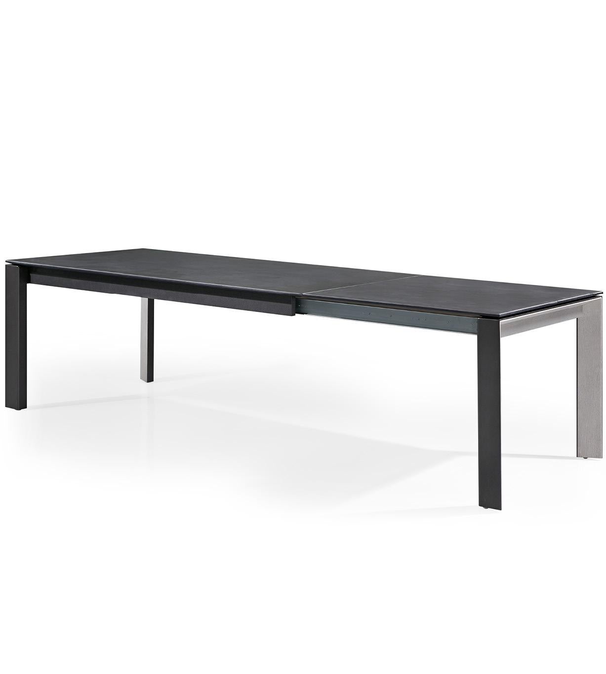 A classic dining table with a ceramic table top and extension. Sits comfortably 6 (+4) people.