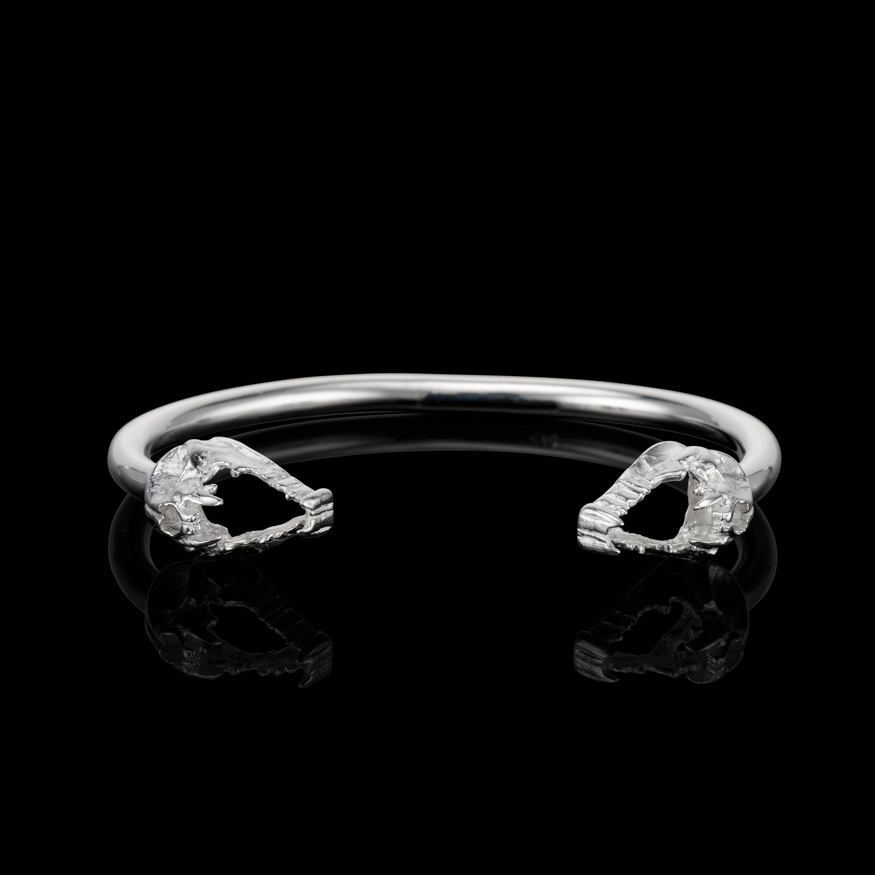 Artisan Ibibio Twin Skull Cuff in Sterling Silver by Egbo Collections For Sale