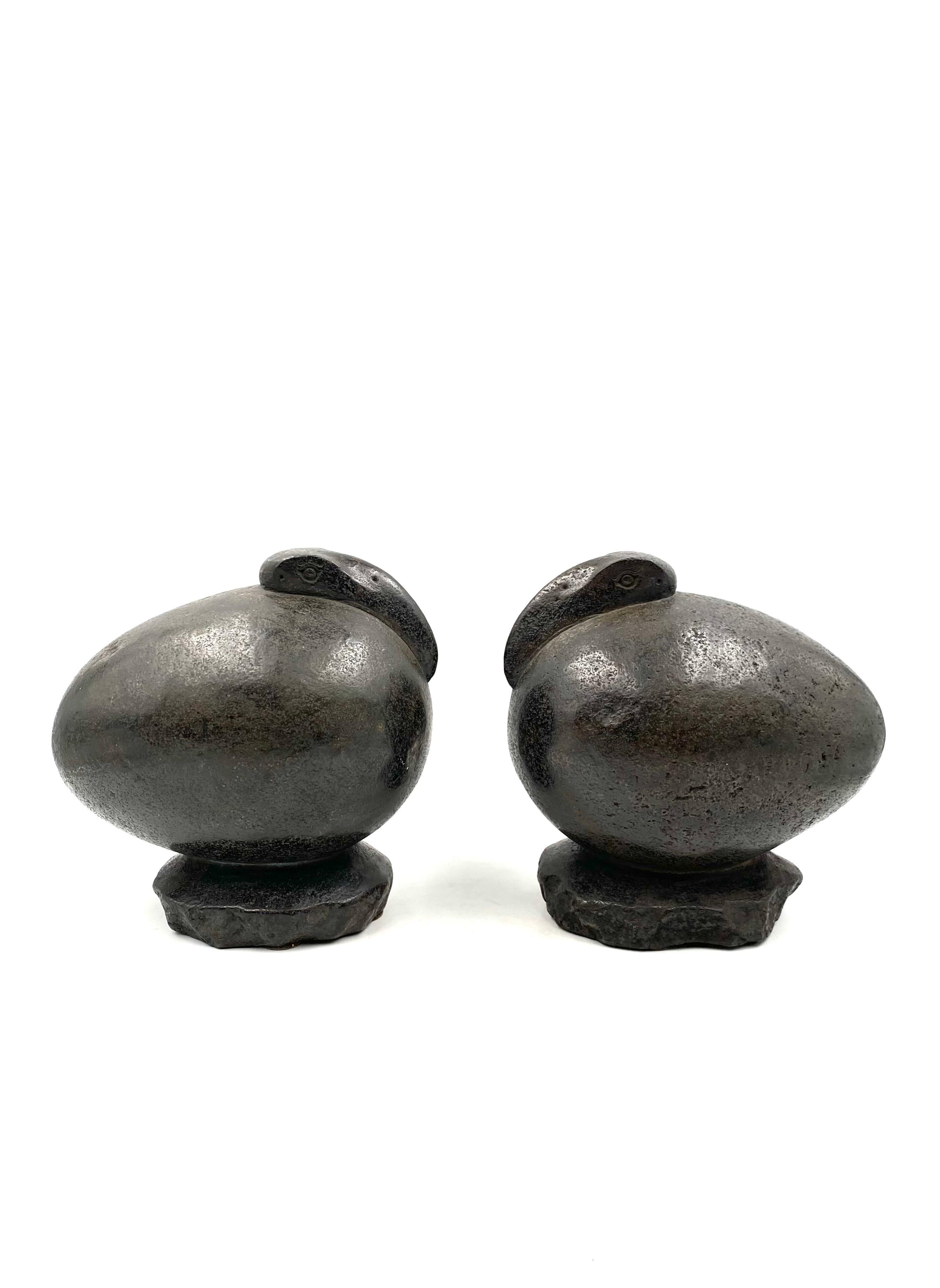 Two egg-shaped Ibis birds sculptures

France early 20th century

Solid raw black Basalt

Measures: H 26 cm

27 x 17 cm

7 kg / piece

Conditions: excellent consistent with age and use.