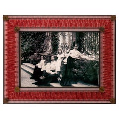 IBISCO red frame with Tessitura Bevilacqua velvet, by Giberto Venezia