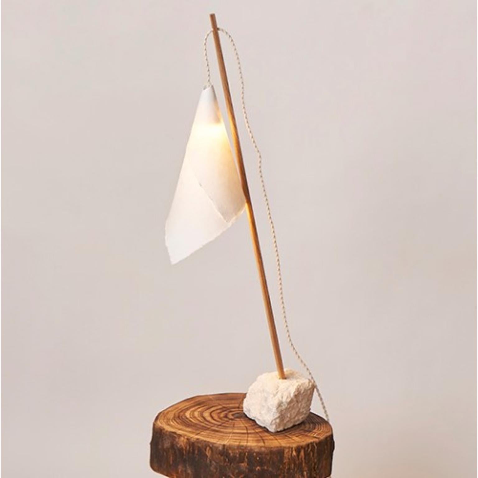 Ibiza table lamp by Jean-Baptiste Van den Heede
Signed, limited edition
Dimensions: 90 cm high
Materials: stone, wood

Design floor and table lamp from the IBIZA collection. Hand-carved stone as well as the wooden shaft and its hand-made paper