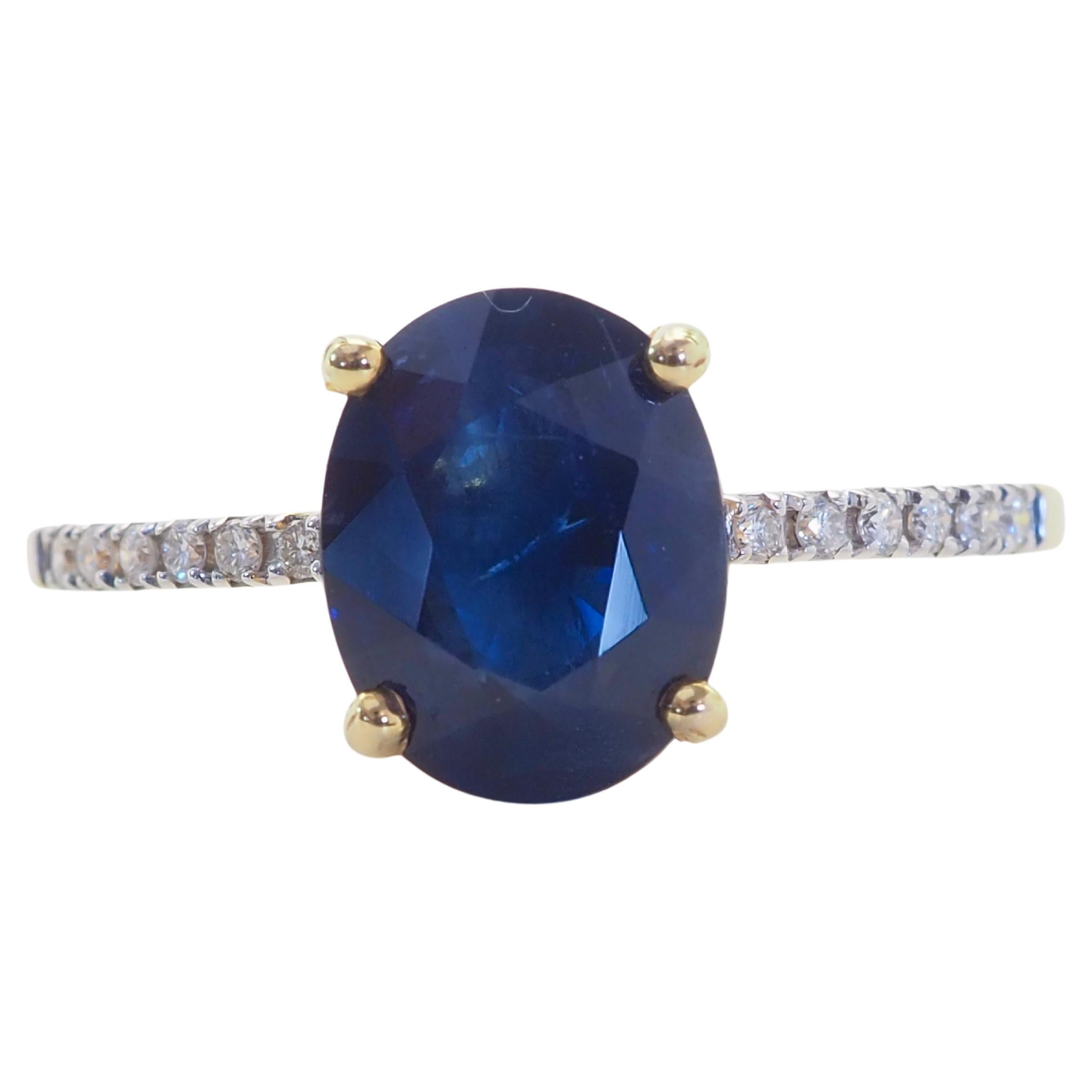 ICA 14K Gold 1.94ct Oval Deep Blue Sapphire 
0.12ct Diamond Ring For Sale