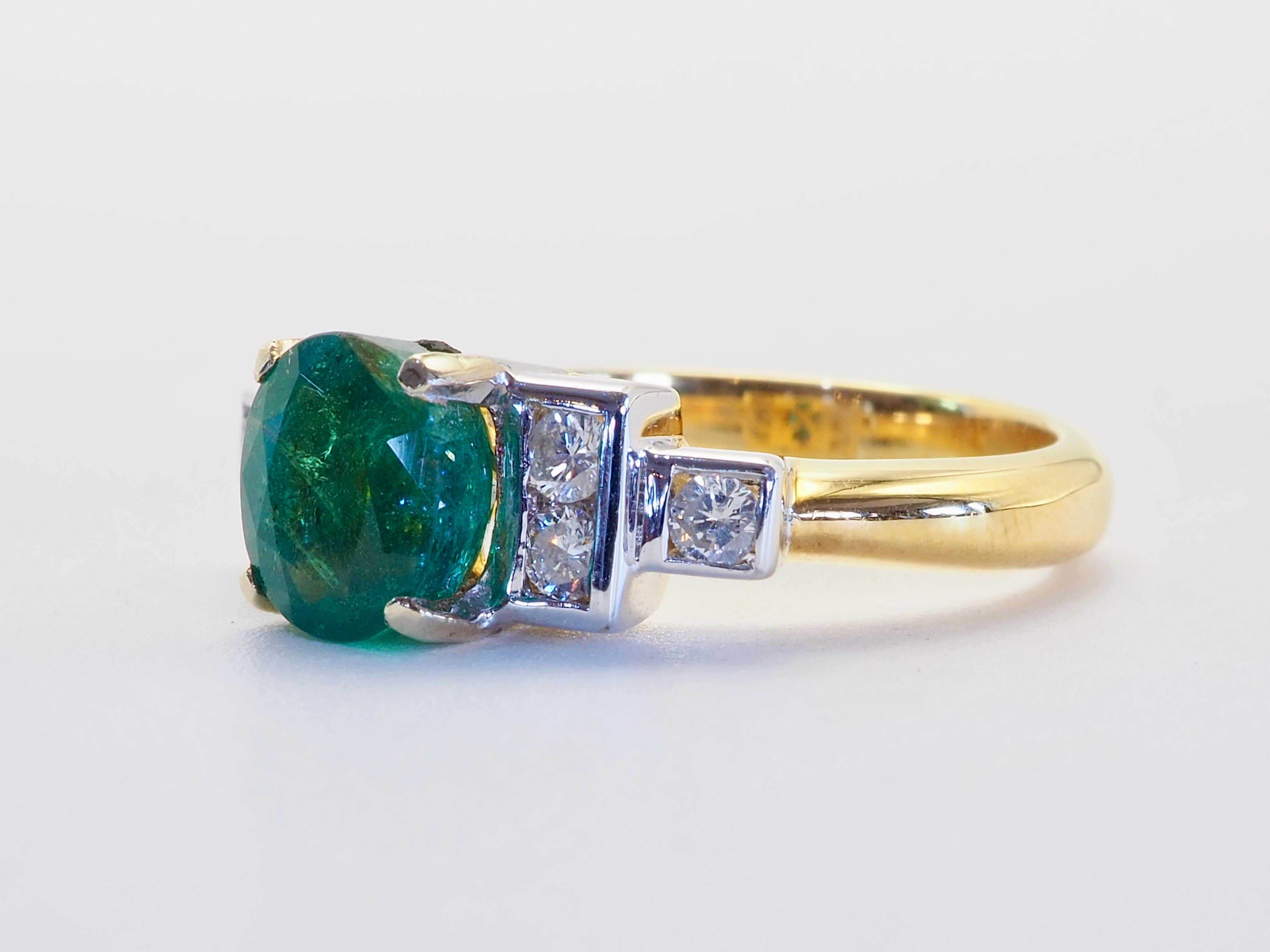 Unique two-tone gold deco design ring with rare minor clarity enhanced oval emerald at the center and surrounded by 6 high grade and decent size bright diamonds. 

Product Details:

Metal: 18k Solid Gold
Metal Color: Yellow Gold with white gold