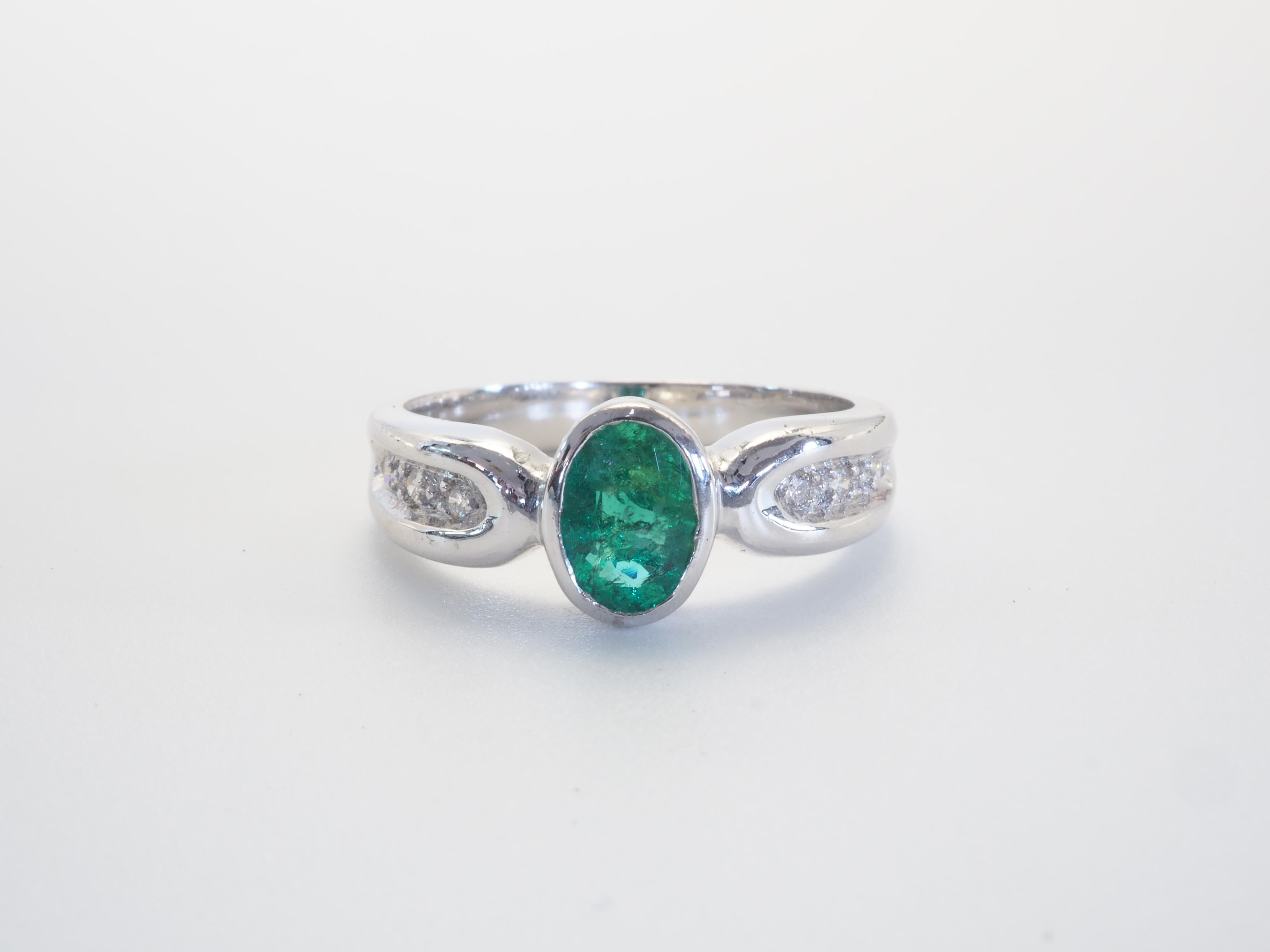  This engagement piece is a beautiful 18K white gold fine emerald and diamond ring! The piece is accompanied by ICA report card #150983 PIN: C6C1 on the wonderful vibrant emerald stating that this beautiful stone has undergone a moderate clarity