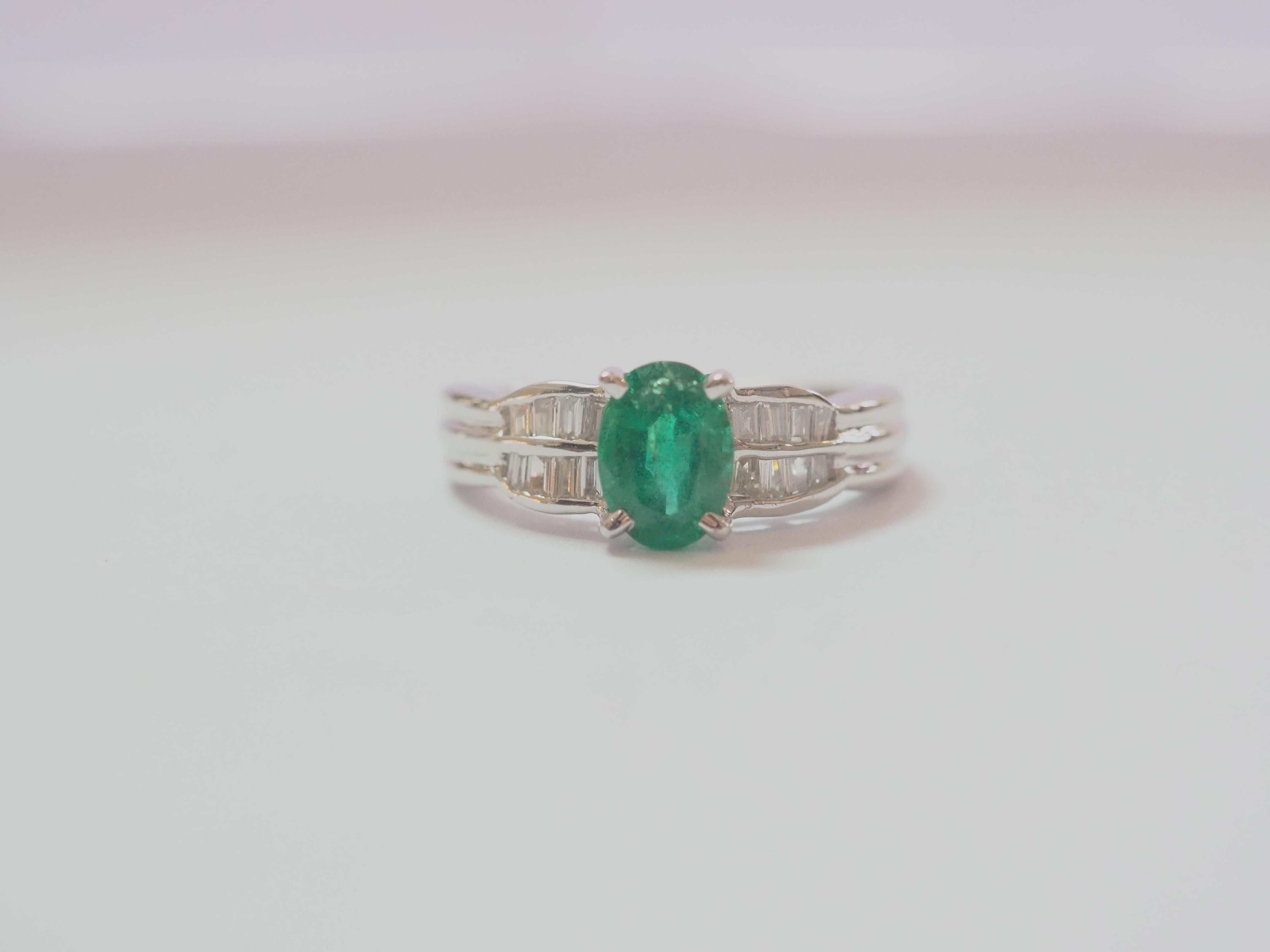  This engagement piece is a beautiful 18K white gold fine emerald and diamond ring! The piece is accompanied by ICA report card #150971 PIN: 04C3 on the wonderful vibrant emerald stating that this beautiful stone has only minor clarity enhancement