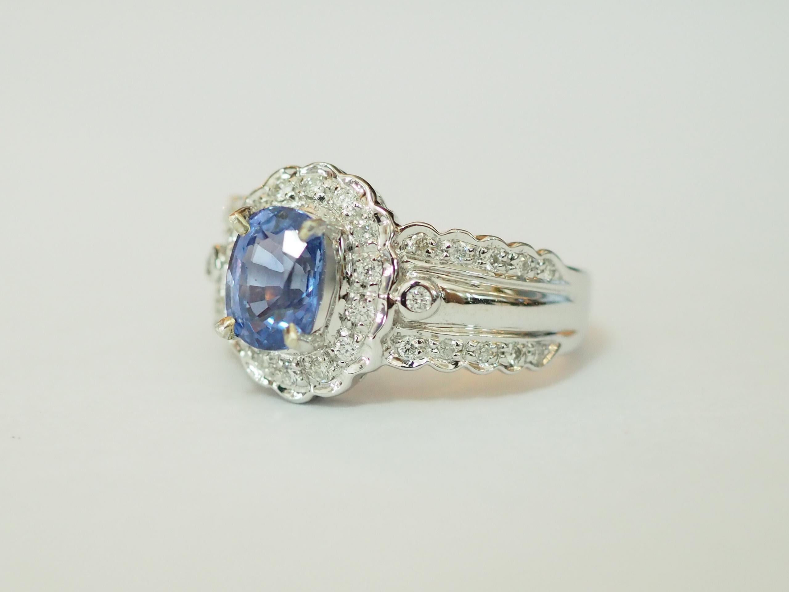 This beautiful cocktail fashion ring boasts a rare and beautiful oval cut blue sapphire from Ceylon, Sri-Lanka! The piece is accompanied by full ICA origin report #162188 on the wonderful Sri-Lankan blue sapphire stating that the gemstone is