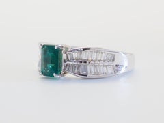 ICA Cert. Bague en or blanc 18 carats avec émeraude octogonale de 0,73 carats et diamant de 0,53 carats