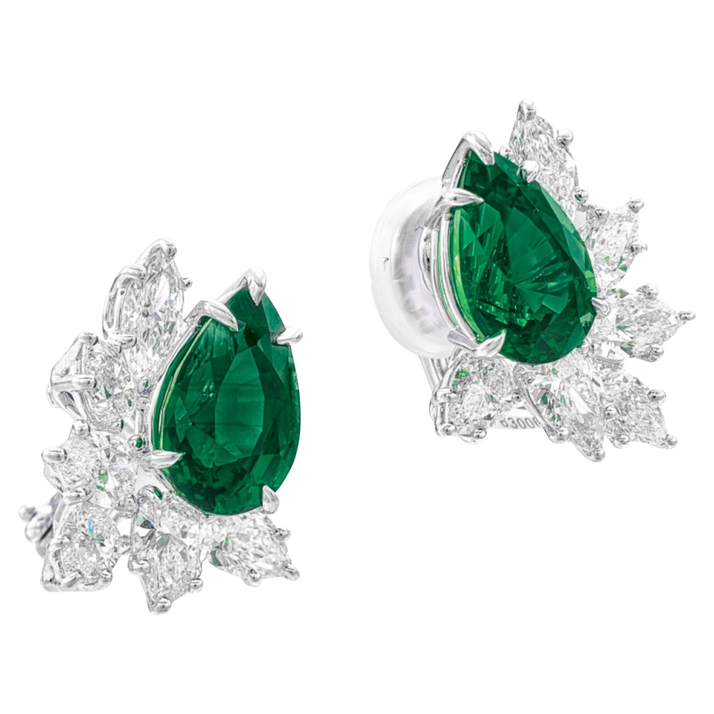 Composed of pear cut emeralds and accented by pear and marquise cut diamonds.

emeralds weighing a total of 4.29 carats, on average 0.30 carat each

18 karat white gold
