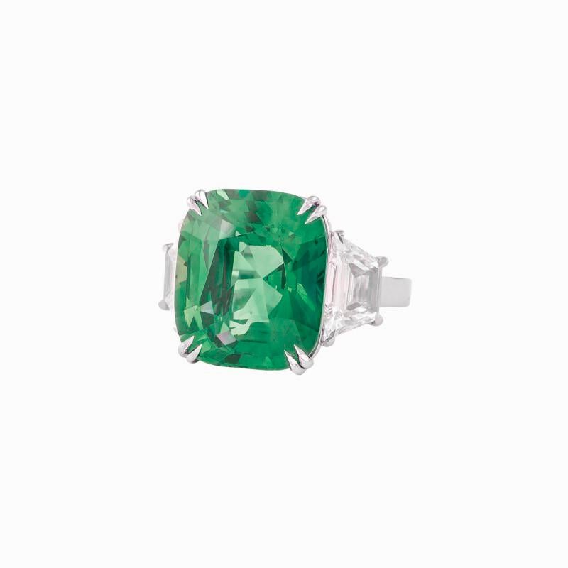Introducing a truly extraordinary piece of fine jewelry: the ICA Certified 5.43 Carat deep green minor oil emerald diamond Ring.

Immerse yourself in the captivating allure of this exquisite ring, featuring a stunning 5.43 carat green emerald of