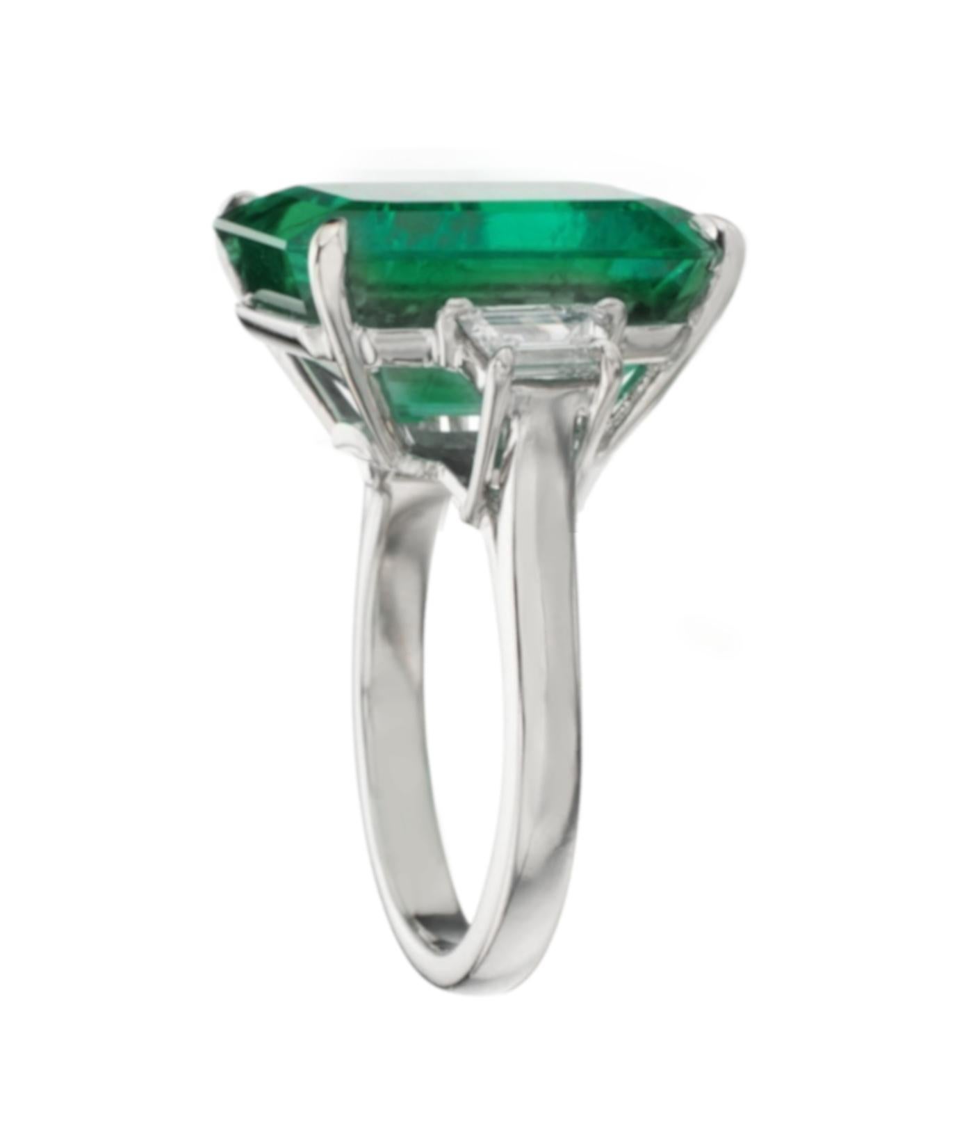 Indulge in the allure of nature's mesmerizing beauty with this distinguished GRS Certified 5.40 Carat Insignificant Green Emerald White Gold Ring.

Center Gemstone:
At the heart of this exceptional piece is a GRS Certified Insignificant Green