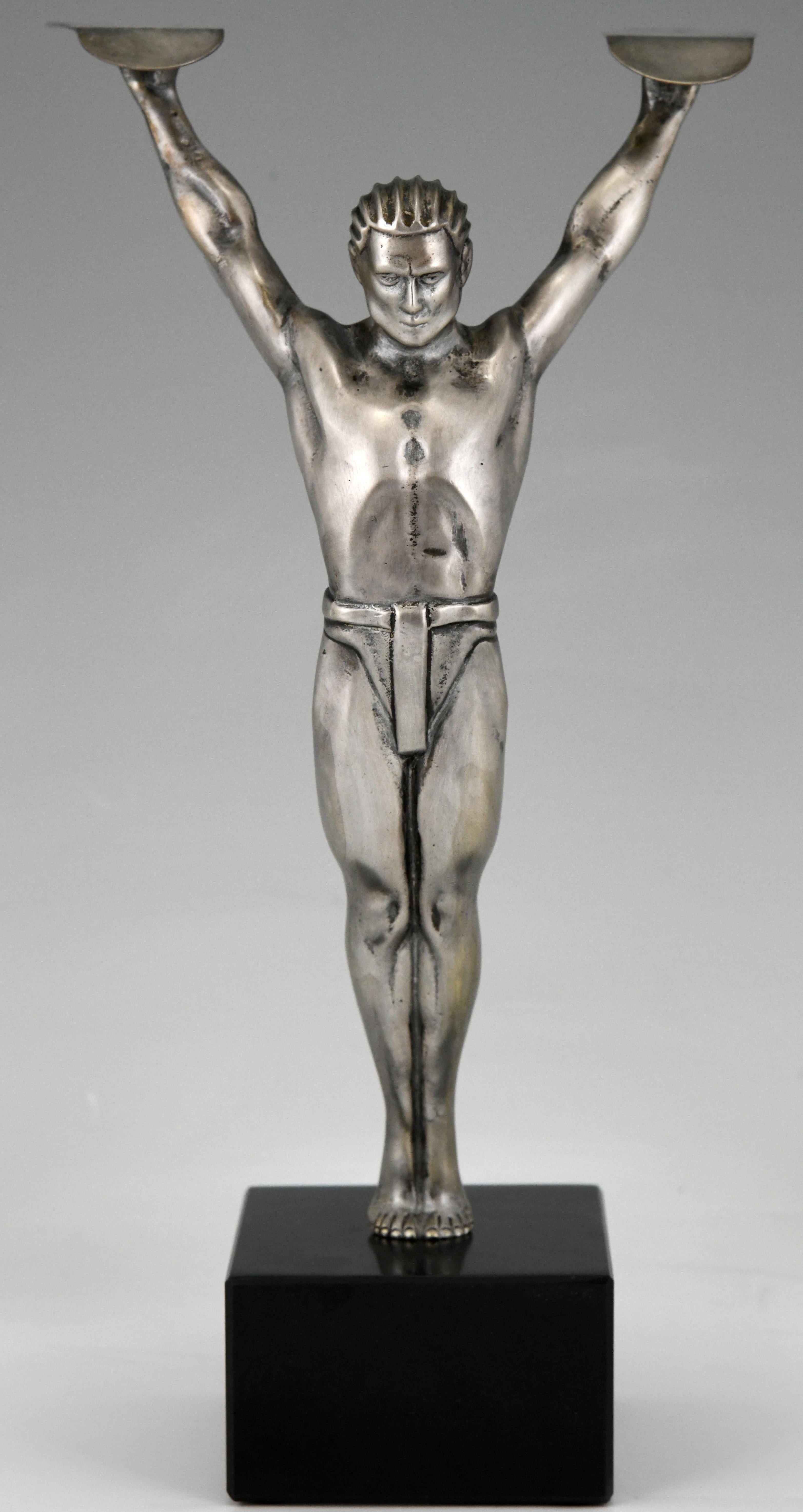 Icarus, stylish Art Deco bronze sculpture of a winged athlete in the style of Otto Schmidt Hofer Germany, circa 1930.
The bronze figure has a silver patina and is mounted on a black marble base.