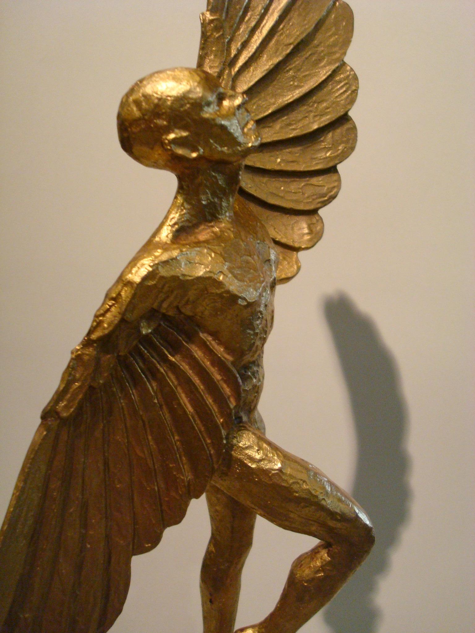 Icarus. Art Deco gilt bronze sculpture of an athletic man with stylized wings, mounted over a marble base.
Icarus has been always been related with aviation or airplane collectibles.
French, 1930s.
 