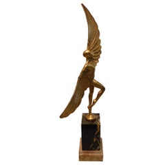Icarus, Art Deco Metal Sculpture of an Athletic Man with Stylized Wings