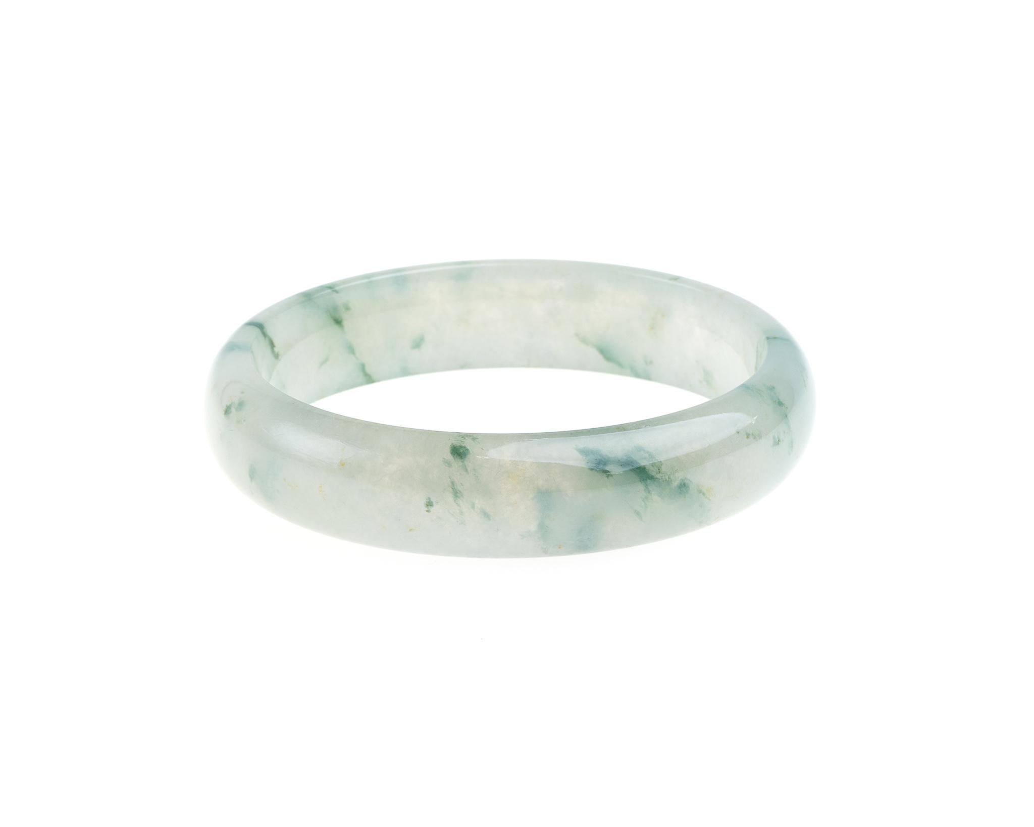 This all natural, untreated ice jadeite jade in green veins. 

The bangle's inner diameter is 2.30 inches (58.4mm) and outer diameter 2.83 inches (71.9mm) with the bangle width of 0.56 inches (14.2mm). 

Included is a Hong Kong Gems Laboratory Jade