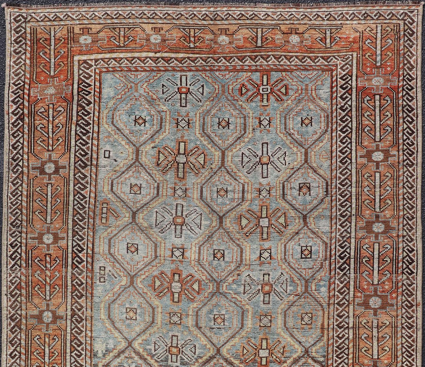 Softly colored antique Persian Kurdish with all-over tribal design, rug SUS-2012-1017, country of origin / type: Iran / Kurdish, circa 1900.

This antique Kurdish tribal rug was woven by Kurdish weavers in western Persia. Often they used this