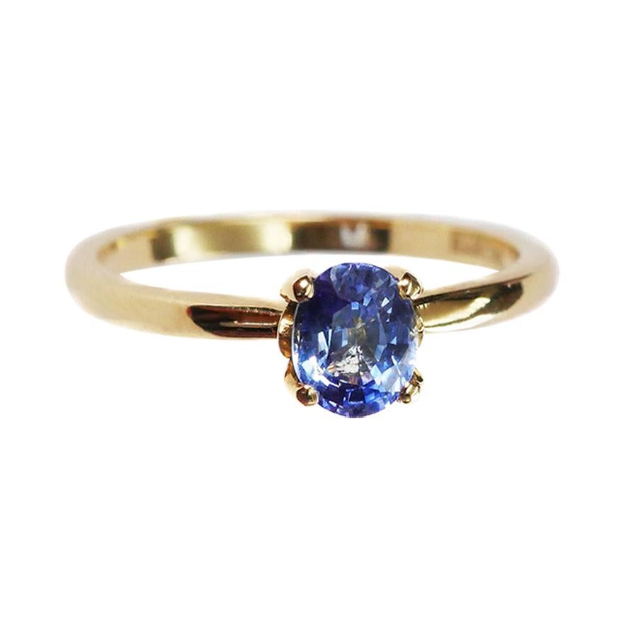 Blauer blauer Saphir Solitär Ring aus 18 Karat Gelbgold