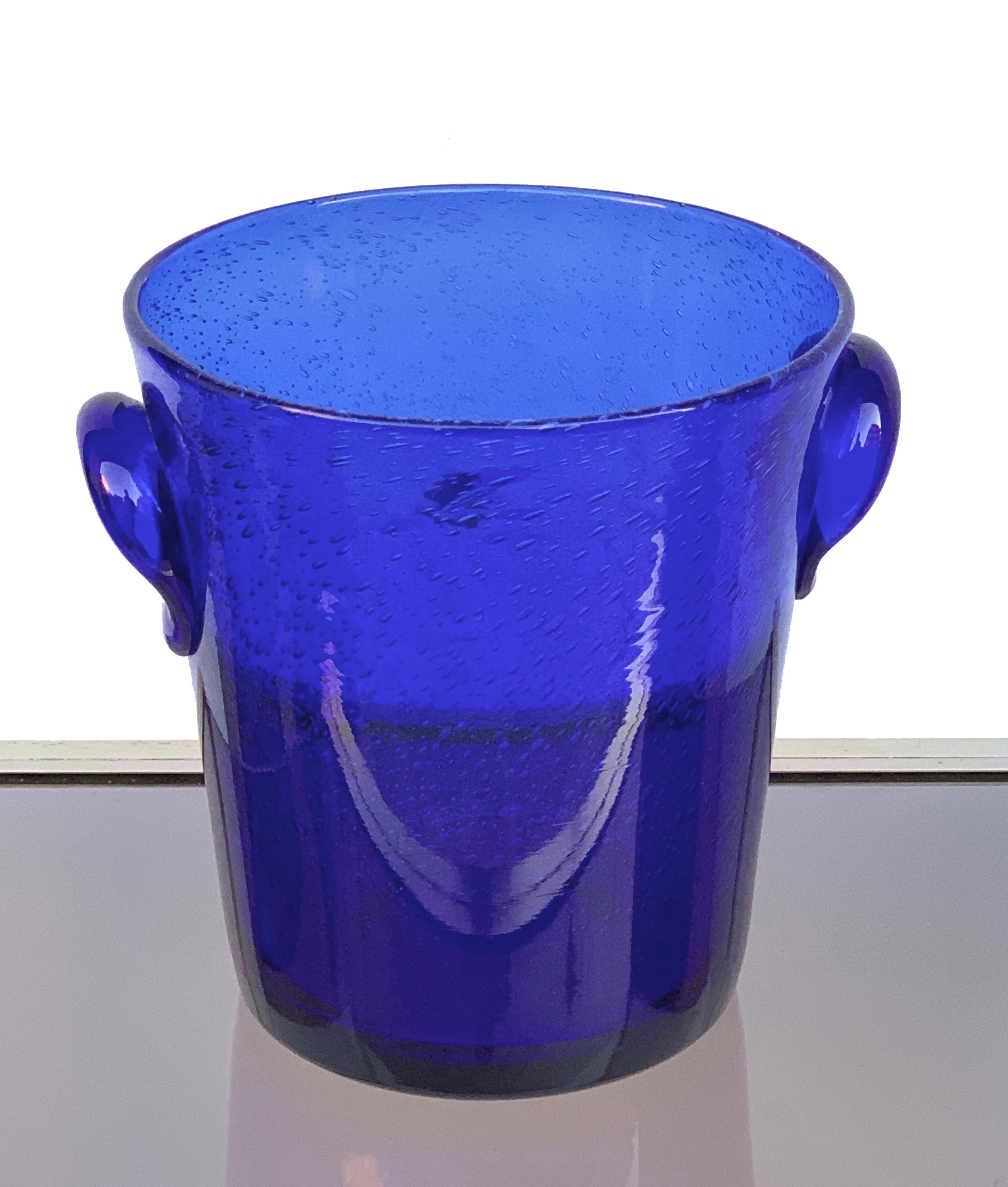 Showy and particular ice bucket in blue glass with air bubbles. Produced by La Verrerie De Biot, France, 1980s.