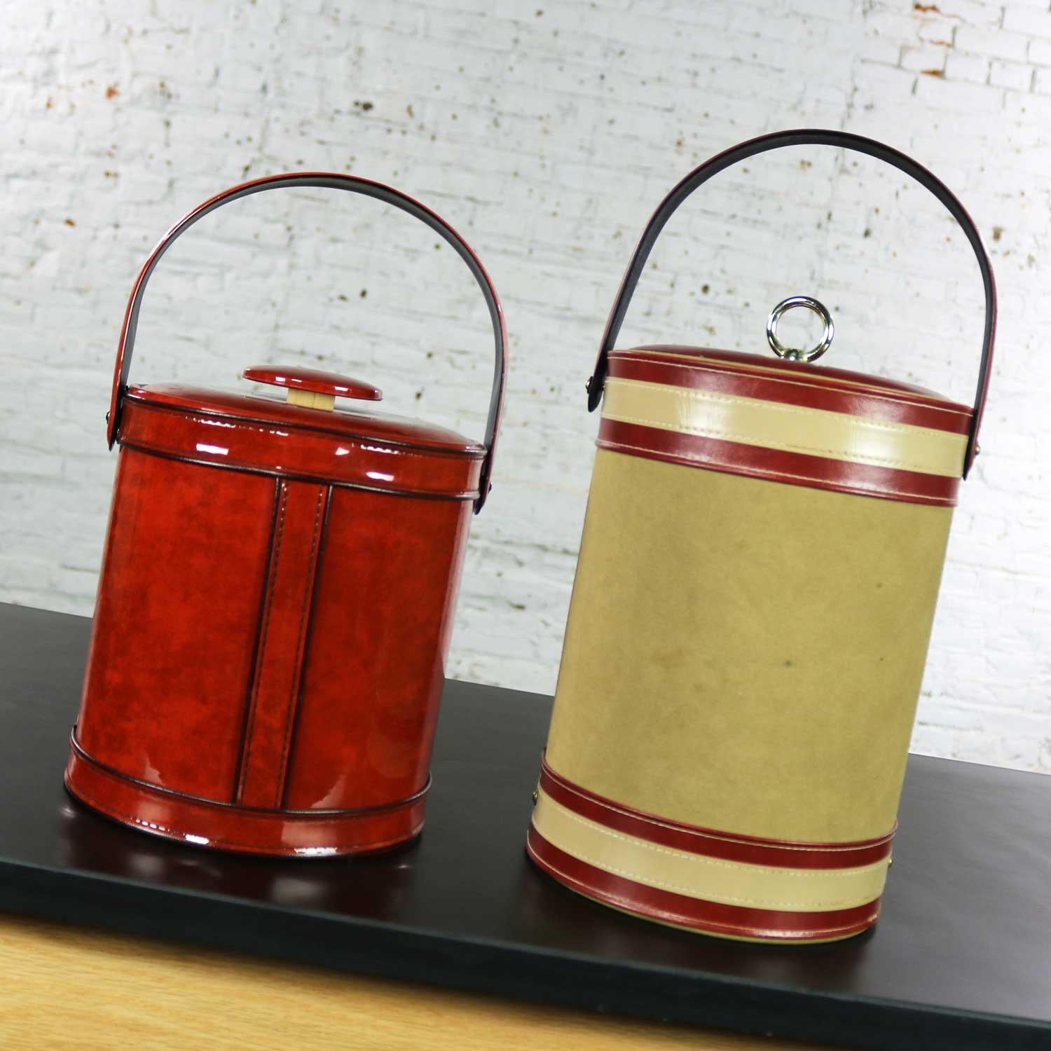 Handsome George Briard ice buckets. One is taller and one is the height we are used to seeing. Both are signed on their bottoms. Both have a similar burnt orange coloration. Both are in wonderful vintage condition. Clean inside and out. Please see