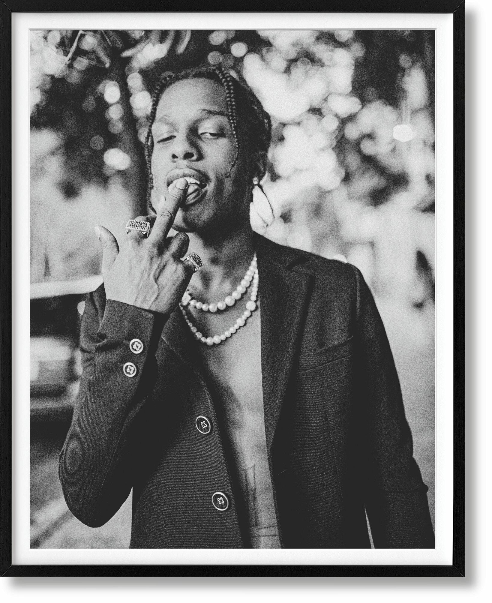 The definitive photographic history of how hip-hop blinged out and redefined the world of jewelry, luxury, and style. 

Signed black-and-white pigment print on Canson Platine paper, 16 x 20 in.; hardcover volume in a slipcase, 9.8 x 13.4 in., 6.29