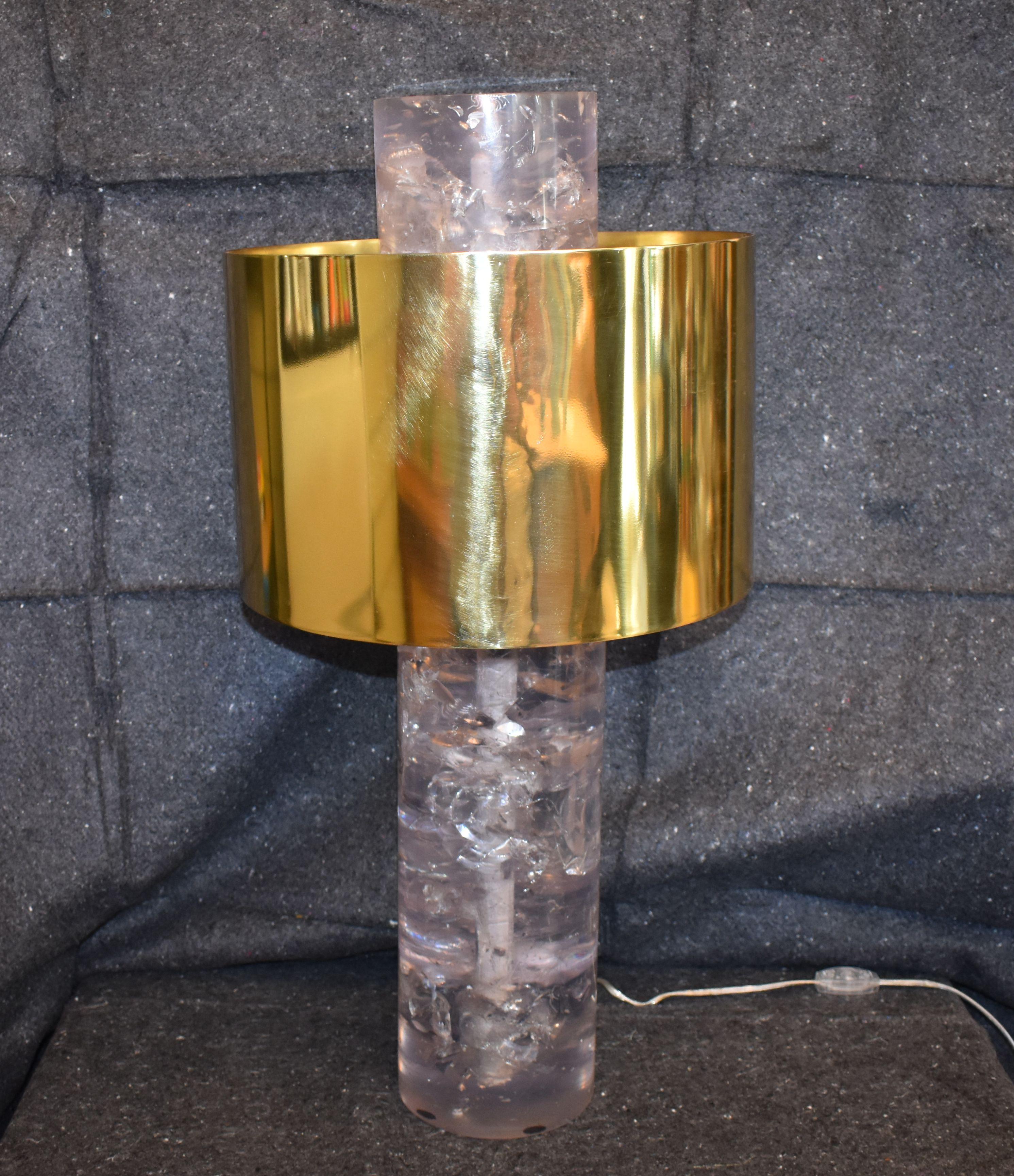 Single sculptural clear ice cracked resin table lamp with resin finial with brass shade.

Measures: Diameter of lamp without shade 6.5 inches.
 Height without shade 17.75 inches
 Height brass shade 10 inches.
  