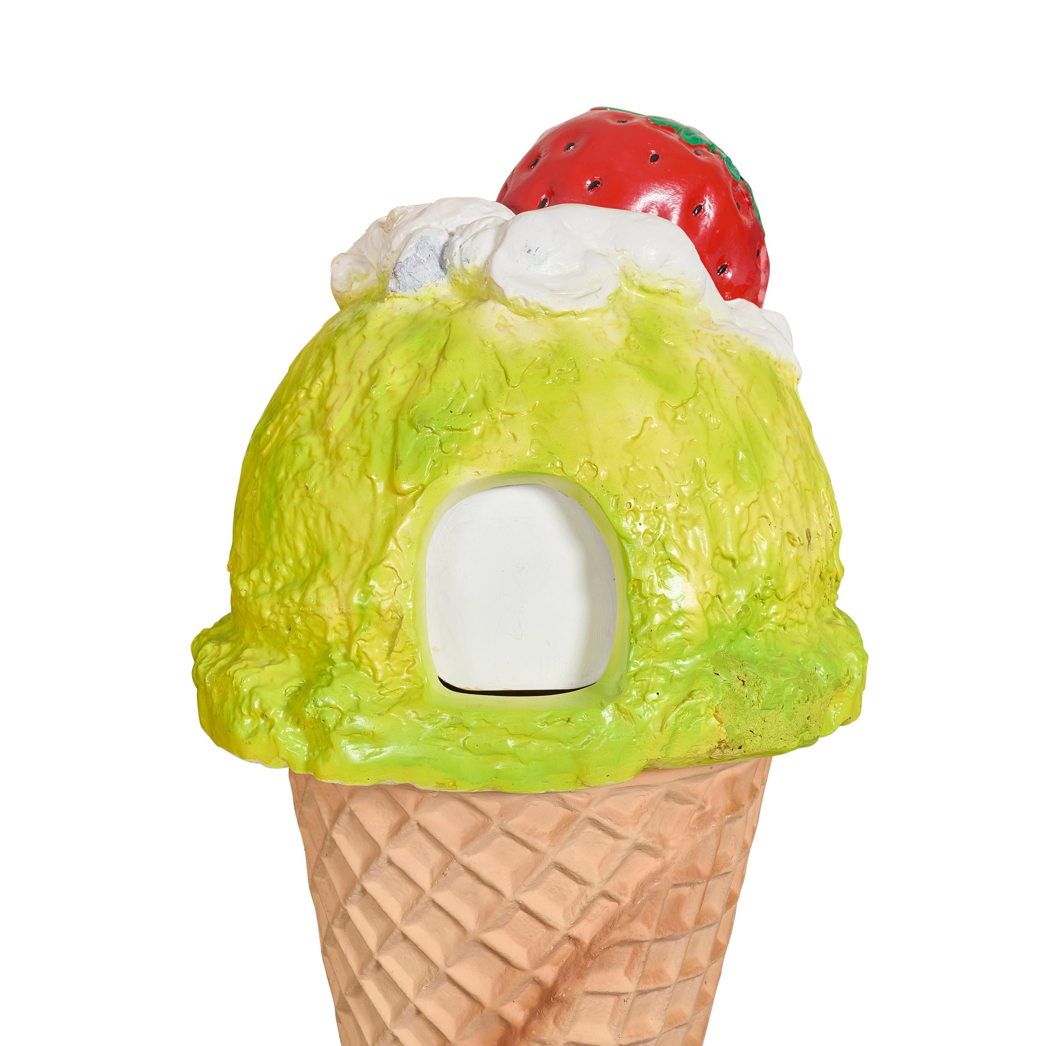 Fiberglass ice cream / gelato cone trash can with three openings. Very fun.