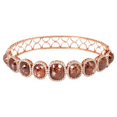 Bracelet jonc glace rehaussé de diamants en or rose 18 carats