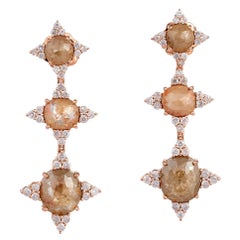 Orecchino a tripla goccia con diamante Ice circondato da pavé di diamanti in oro 18 carati