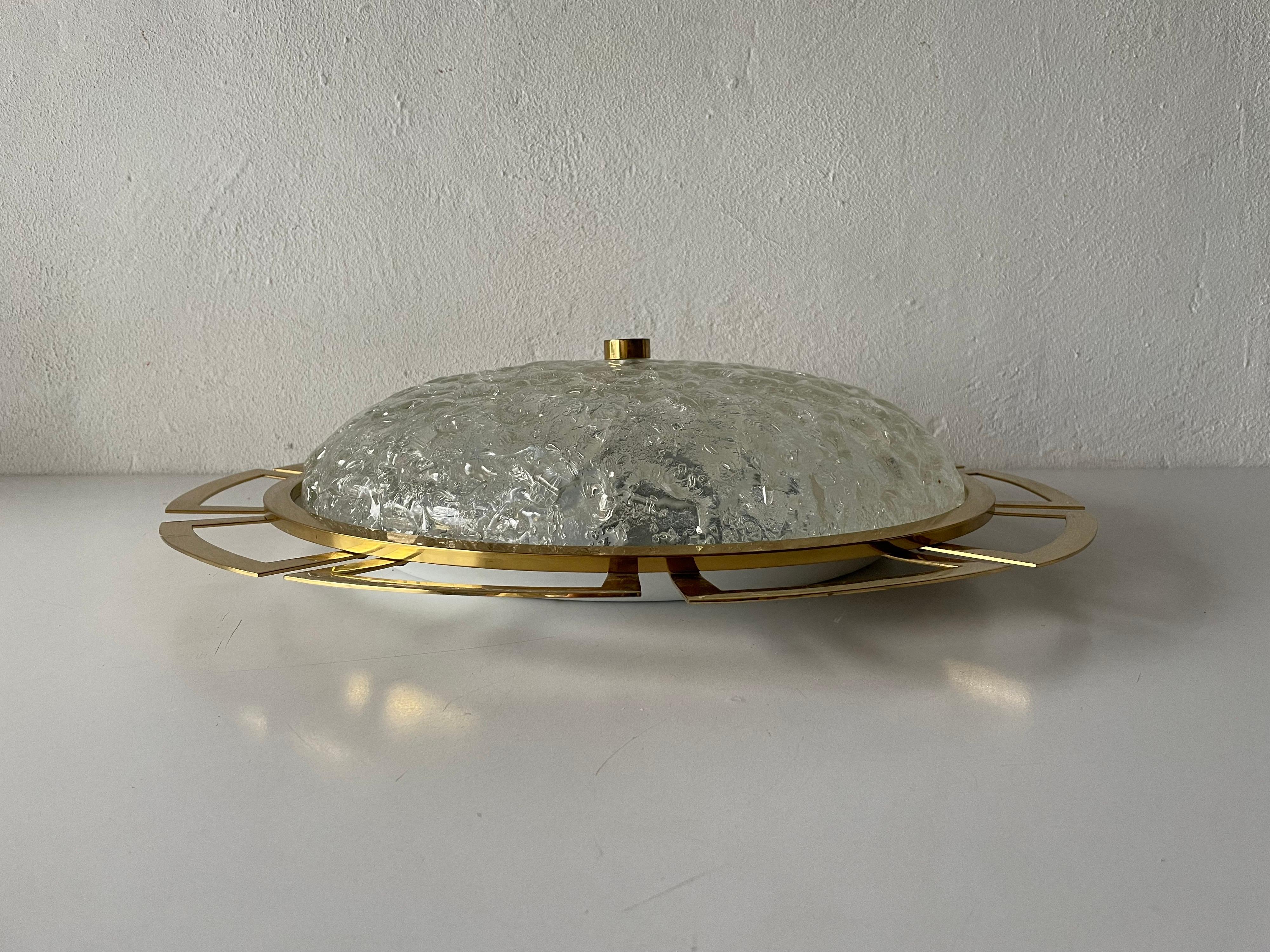 Charming ice glass & brass sunshine design large ceiling lamp by Schröder Leuchten, 1960s Germany

Lampshade is in very good vintage condition.

This lamp works with 4xE14 light bulbs. 
Wired and suitable to use with 220V and 110V for all