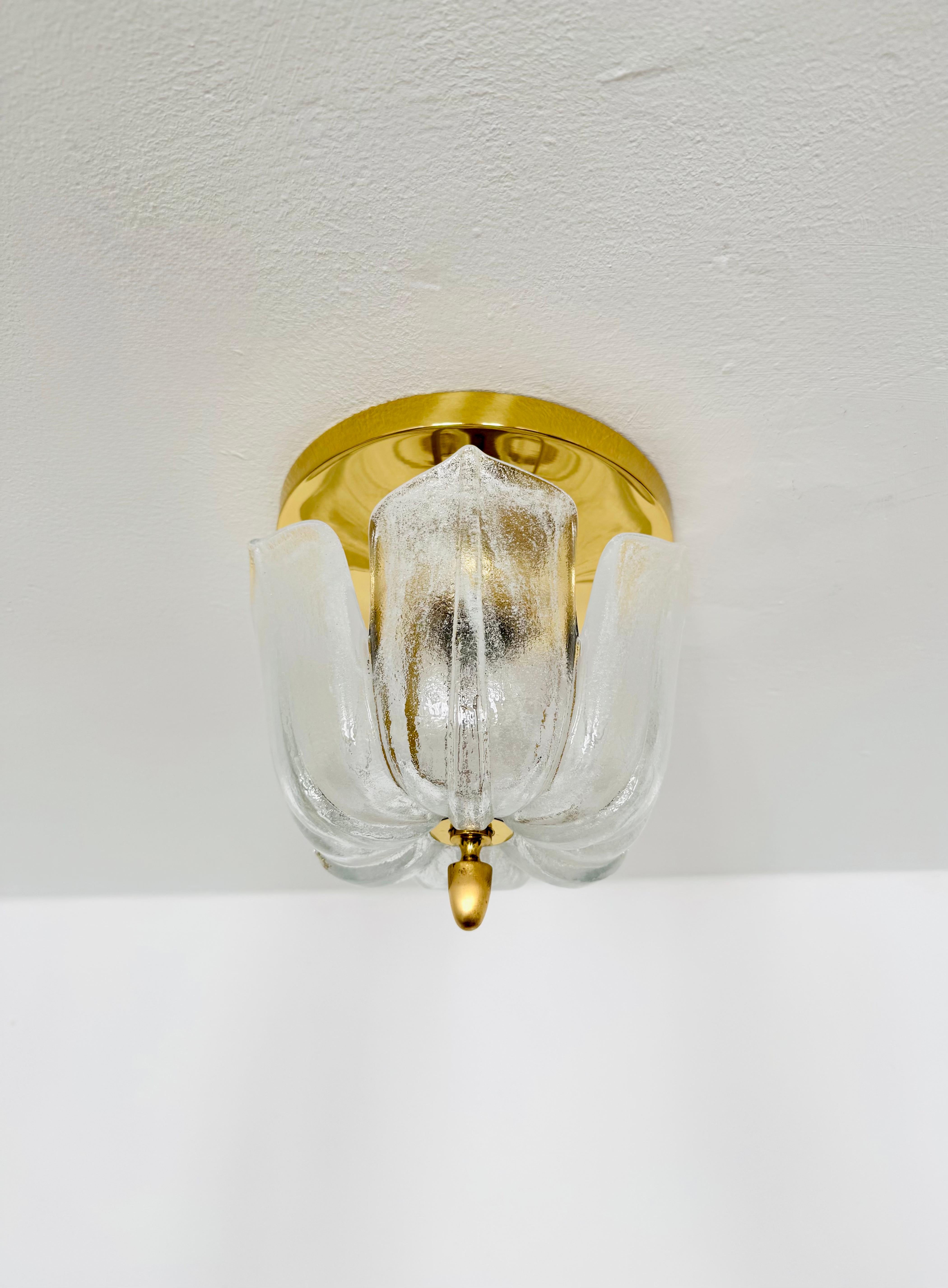 A very beautiful ceiling lamp from Glashütte Limburg.
The lamp creates a wonderful play of light in the room and enchants with its radiance.
Wonderful design and very high-quality workmanship.

Manufacturer: Glashütte Limburg

Condition:

Very good