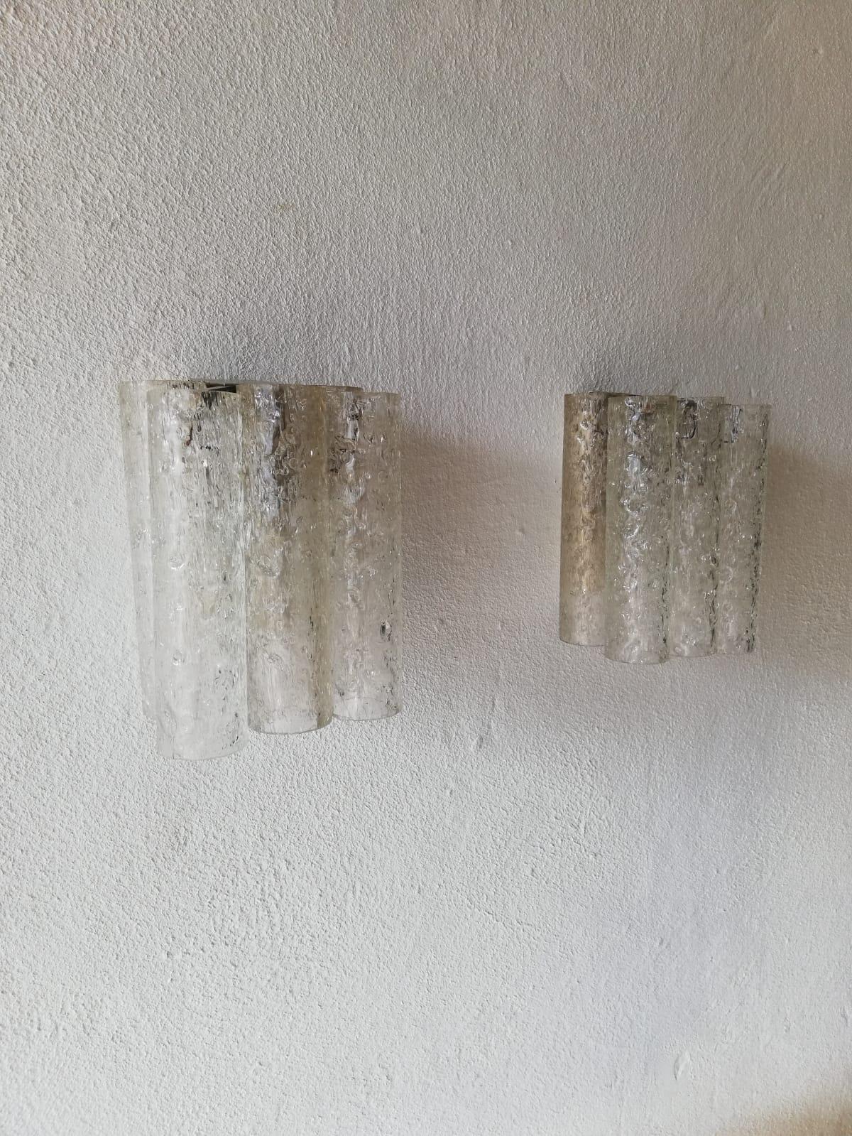 Ice glass tubes pair of sconces by Doria Leuchten, 1960s Germany

Excellent 3 tubes wall lamps.

Lamps are in very good vintage condition.

These lamps works with E14 standard light bulbs. 
Wired and suitable to use in all countries. (110-220