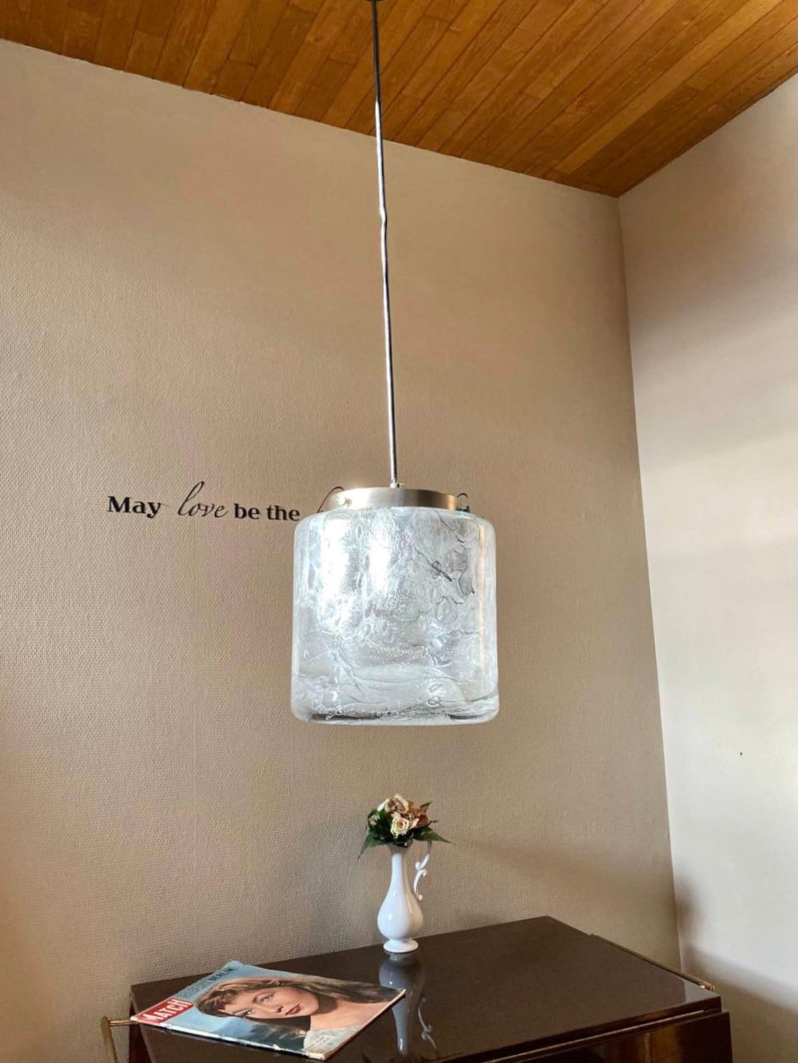 Stylish vintage pendant light.

Pendant light made of murano glass (made in Murano, Italy).

This pendant light is perfect for a Loft, Minimalism, Electrical, Modern interiors.

In very good vintage condition.

There is a small crack.

The