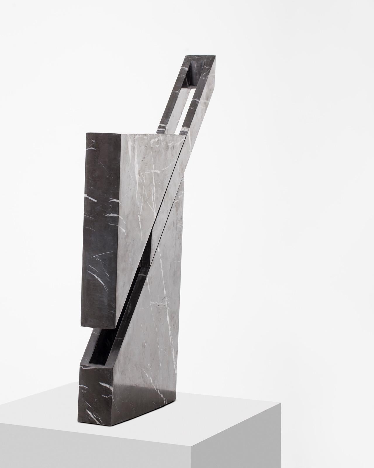 Doric marble table lamp by Carlos Aucejo
Dimensions: 57 x 39 x 7 cm 
Materials: Pietra grey marble

Iceberg
It is a functional sculpture made with Pietra Grey (Iranian marble). The piece is presented in its primitive morphology. It is a compact
