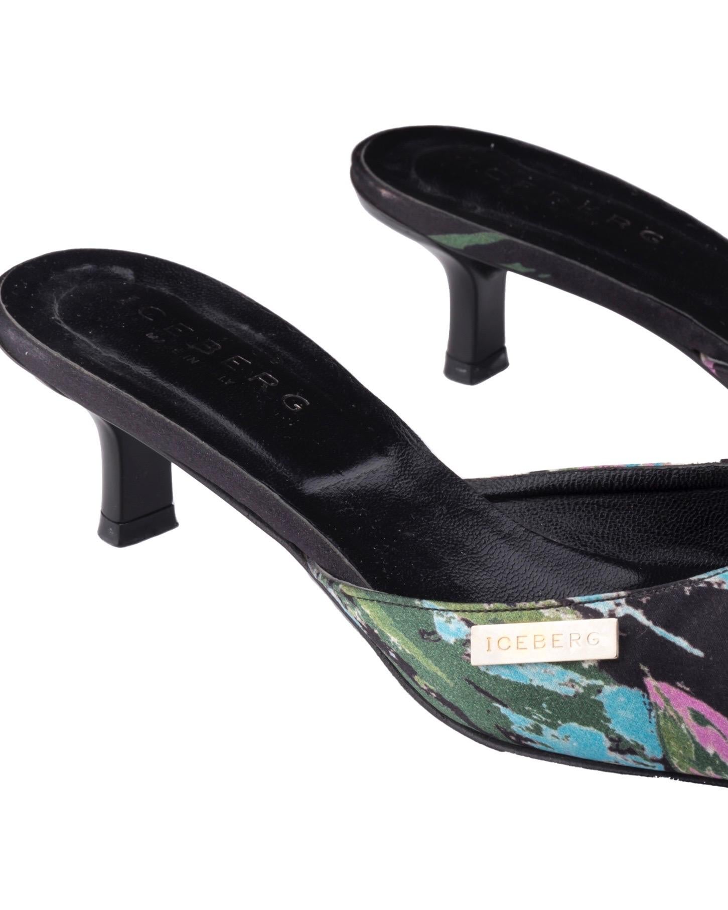 - Iceberg silk mules 
- Sold by Gold Palms Vintage
- Spring/Summer 2003 
- Black/pink/blue floral graphic print
- Kitten heels
- Size 38 / US 7