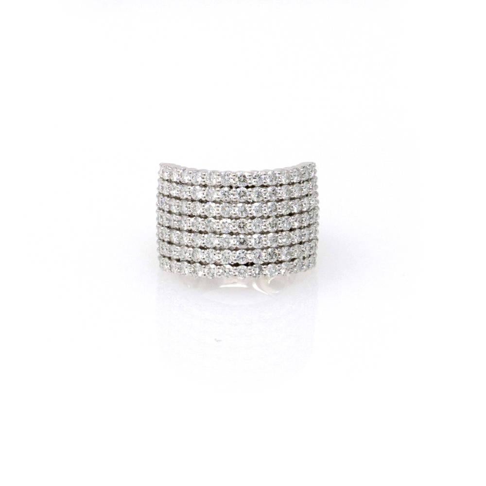 18k white gold with 105 round diamonds totaling 3.63 carats. 
G-H color, VS2-SI1 clarity