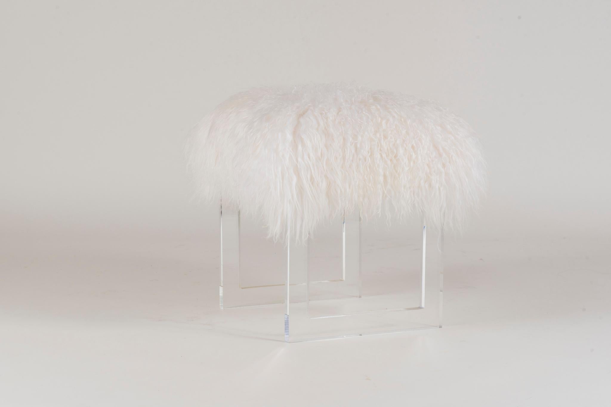 A custom longhair Icelandic woolly sheepskin Lucite bench.

Dimensions shown are of frame structure and do not include the poufing of the fur.

Measures: Finished frame is 20