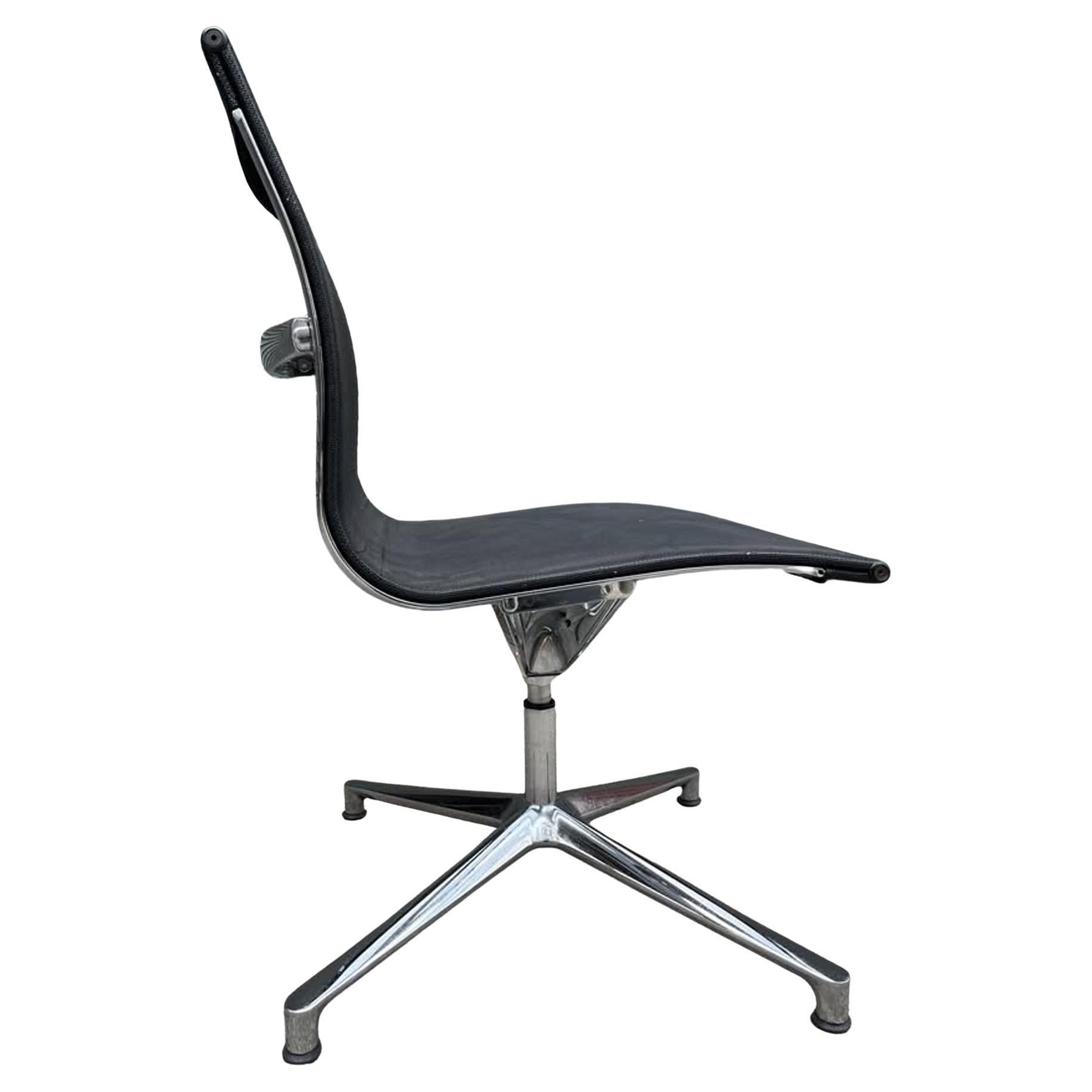  ICF armless and swivel with return (spring back to front). Shiny chromed aluminum in wonderful shape with very comfortable mesh upholstery that is durable and easy to clean.

Mesh is translucent black. Pics show background with rollup gate not
