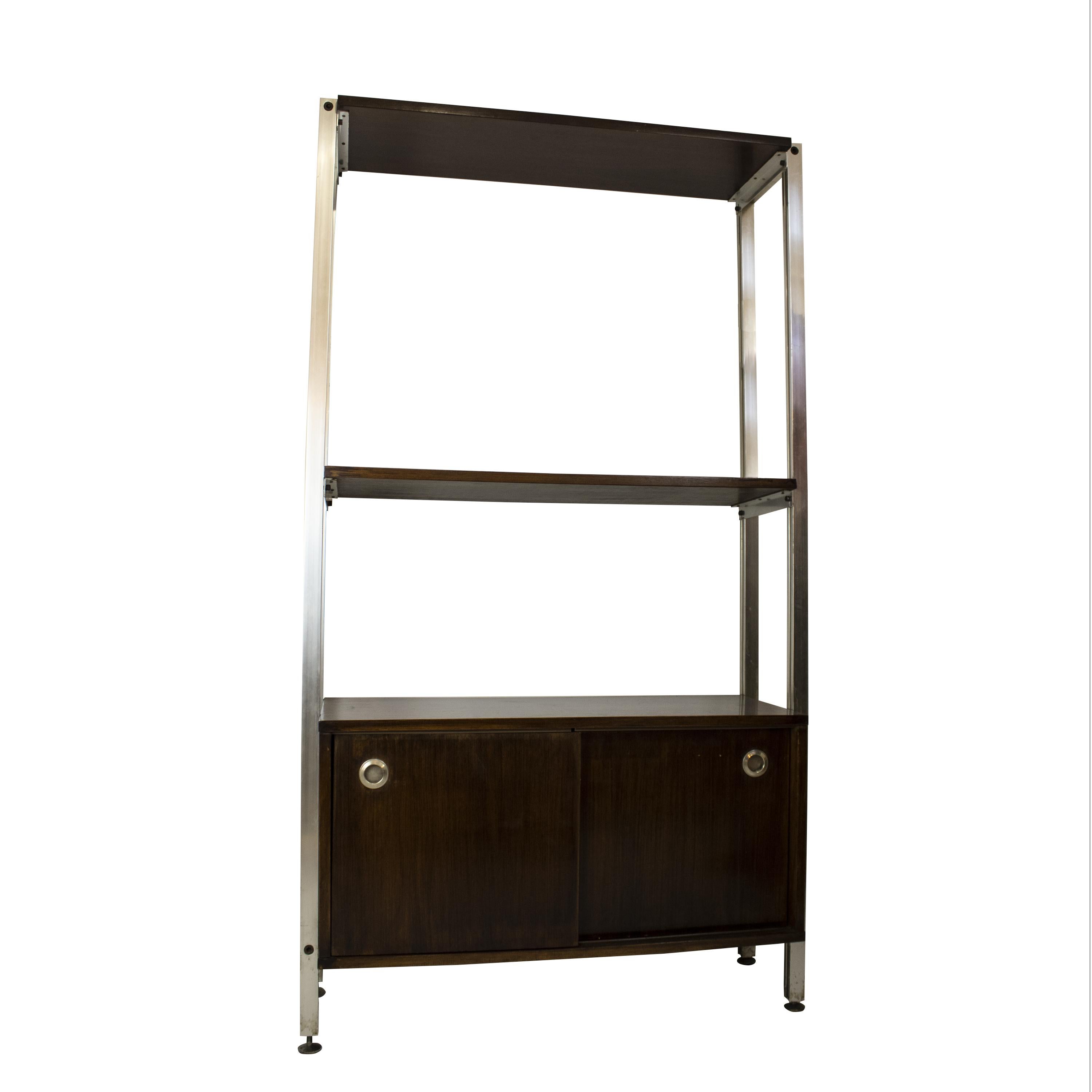 Italian office shelf unit edited by ICF Padova in the 1970s. It consists of steel frame structure with teak shelves and one storage module with sliding doors.