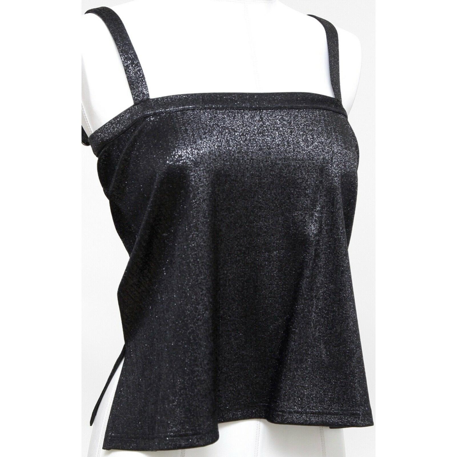 GUARANTEED AUTHENTIC PRE-SPRING 2018 CHANEL METALLIC BLACK SLEEVELESS TOP

Retailed excluding sales taxes, $1,795

Design:
- Stunning metallic black spaghetti strap sleeveless top.
- Square neck.
- 2 CC bottons at rear straps.
- Slip on style.
-