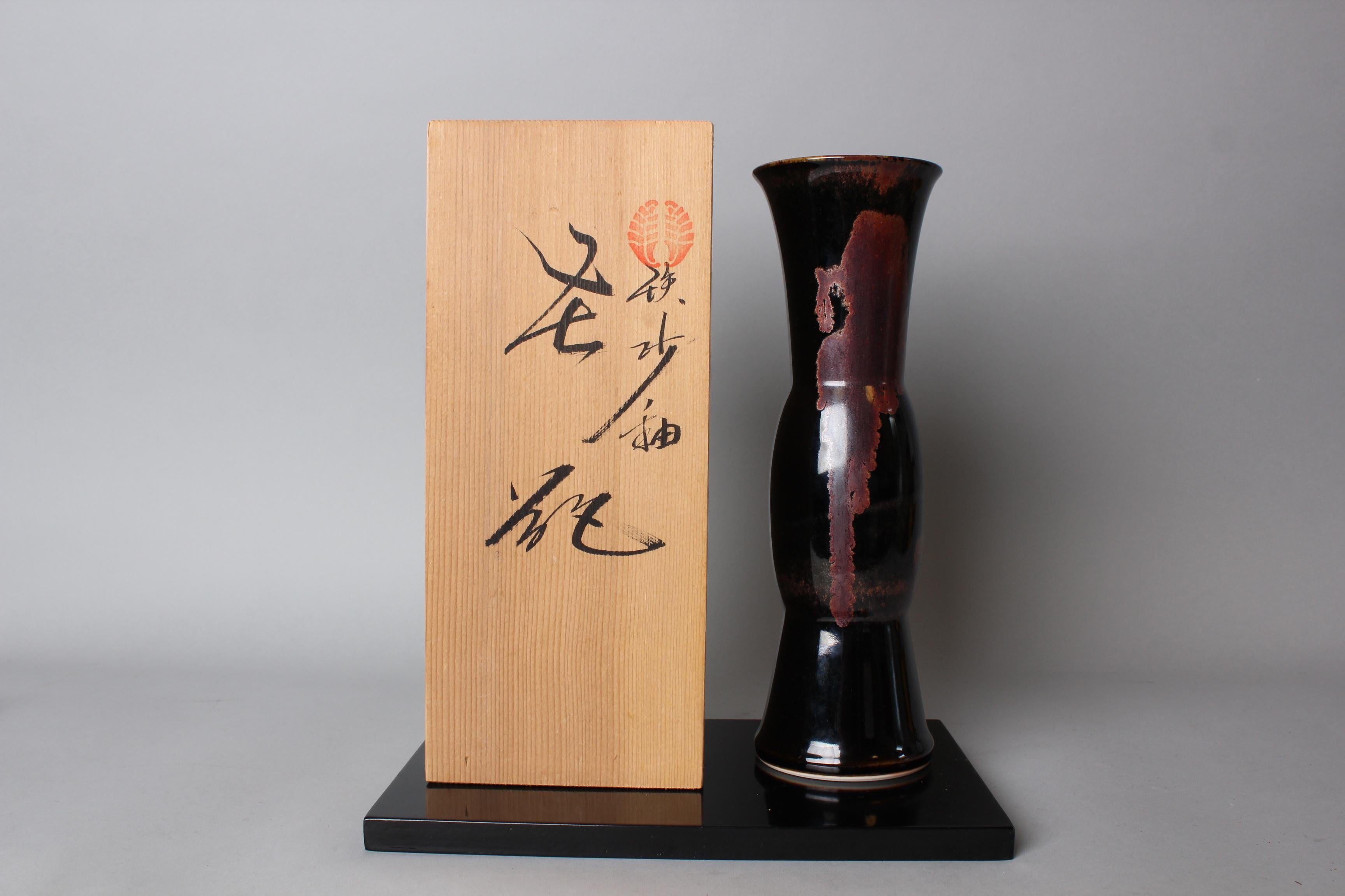 Captivating Nabeshima ceramic vase by Master Artisan Ichikawa Kouzan. Continuing the legacy of 18 generations of ceramics production since the late 16th century. Patronized by Nabeshima Daimyo, a powerful samurai lord, and renowned for unmatched
