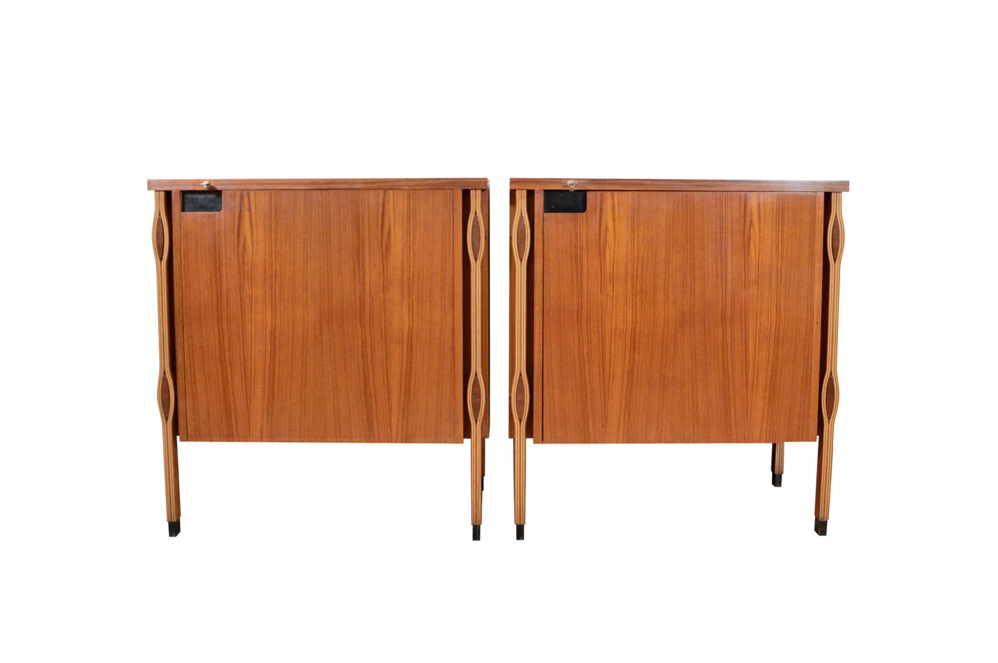Pair of Taormina teak cabinets, designed by Ico and Luisa Parisi for MIM, Mobili Italiani Moderni, Rome, in 1958.
This series of furniture is characterized by the original construction, according to which the curved plywood legs wrap with a sinuous