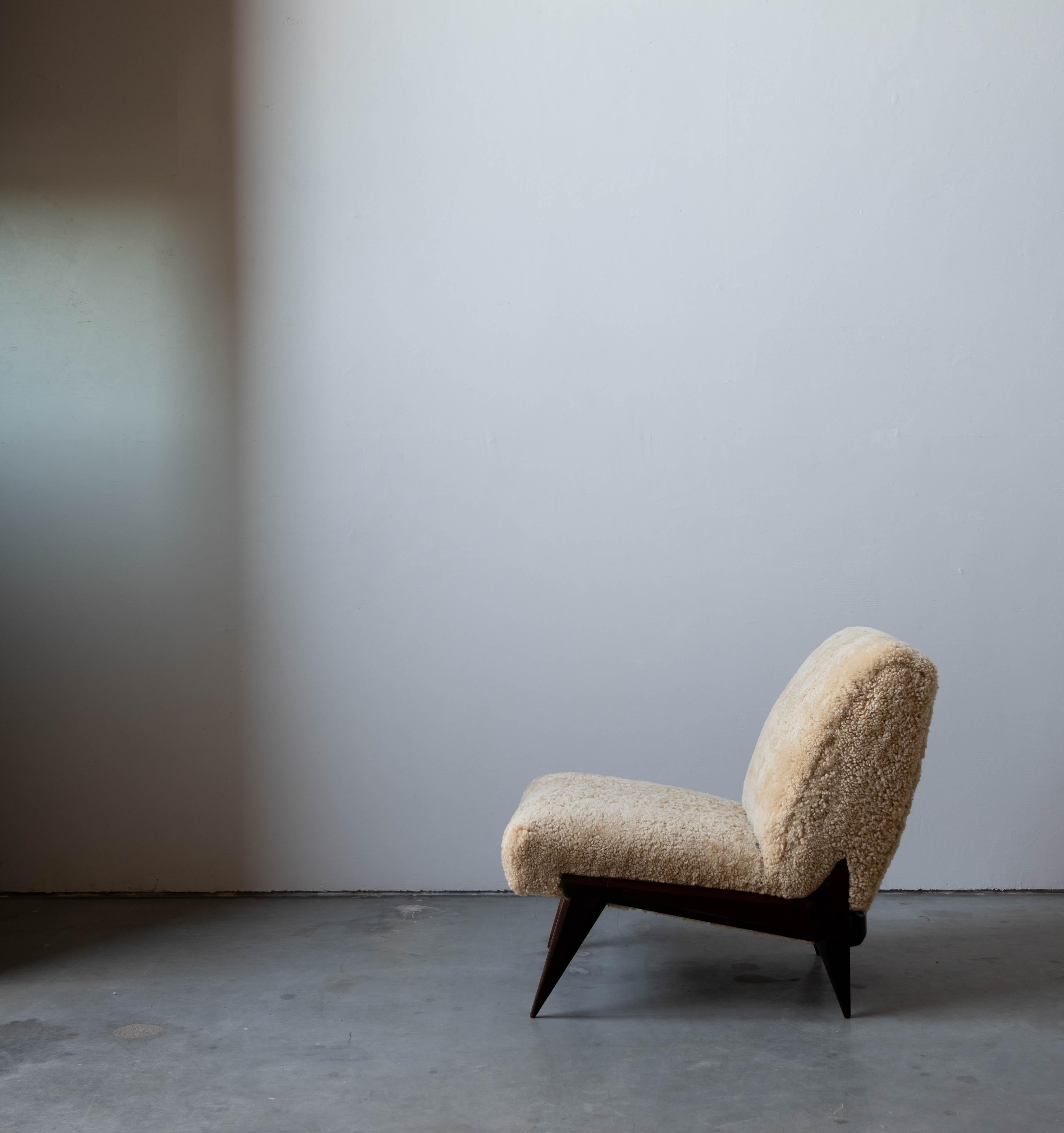 Italian Ico Parisi 'Attribution' Slipper Chair, Dark-Stained Wood, Shearling Italy 1950s
