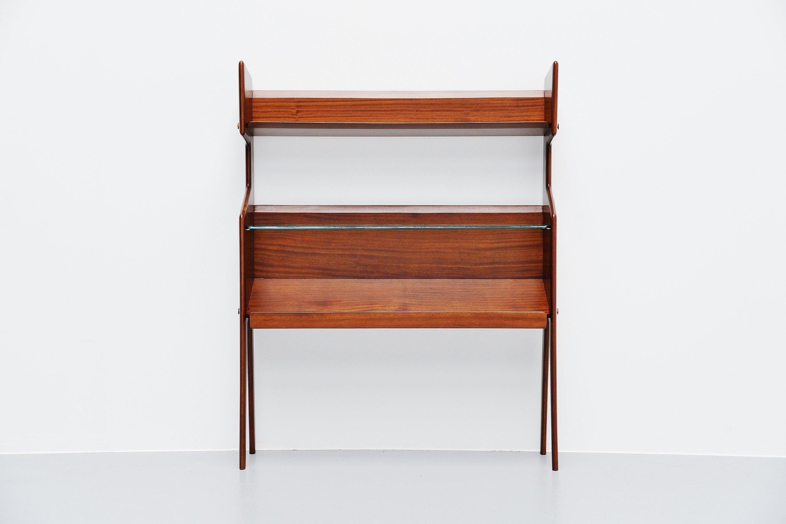 Super rare and beautiful bookcase model 459 designed by Ico Parisi and manufactured by Angelo De Baggis Cantu, Italy, 1955. The bookcase is formed of 2 solid wood carved supports with long, sleek legs at the bottom. The supports are joined together