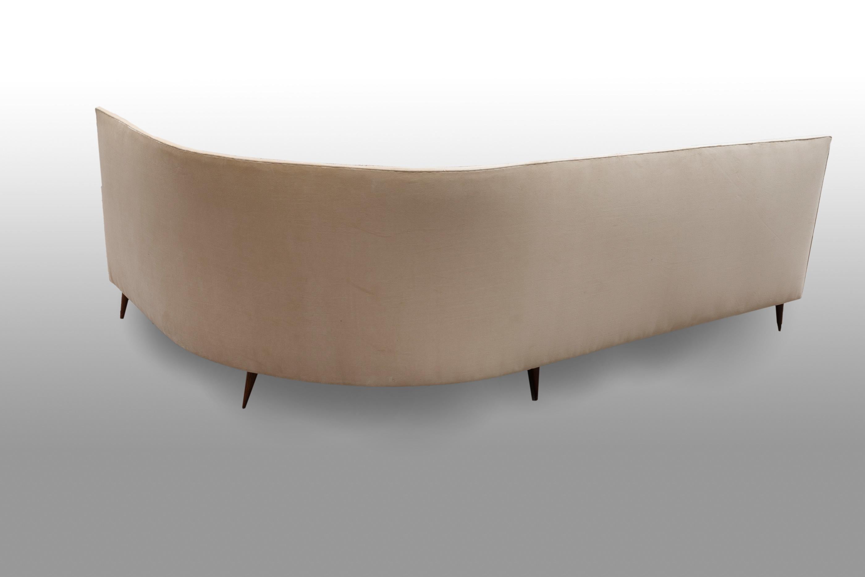 curved cream sofa
