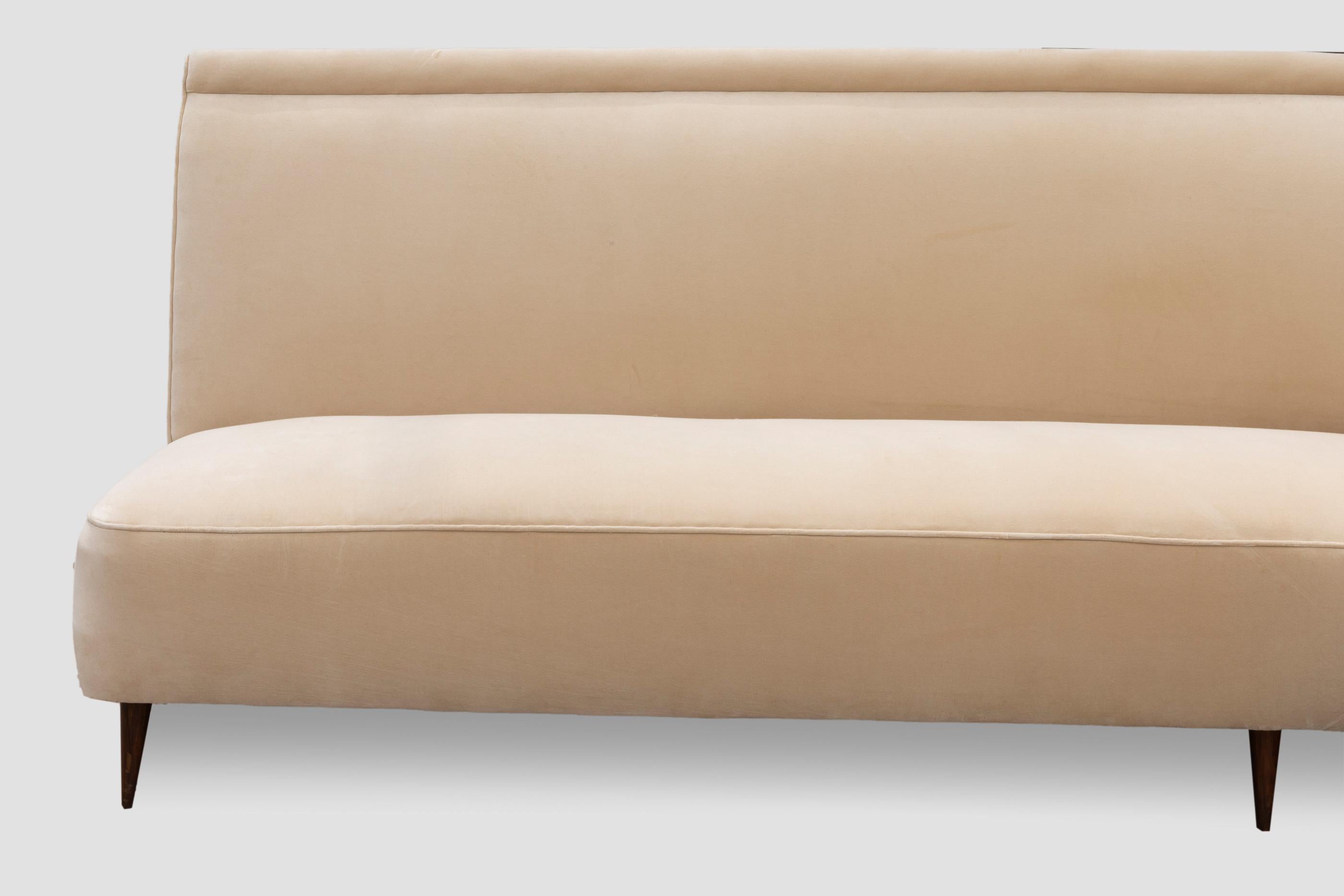 cream curved sofa