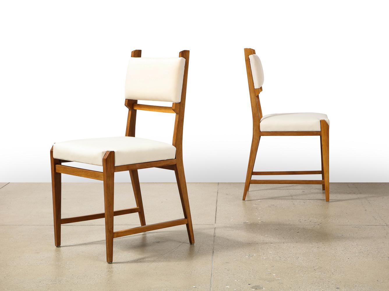 Rare Set of 6 Dining Chairs by Ico Parisi. Italian walnut, fabric. Produced by Fratelli Rizzi, Intimiano, Italy. Fantastic architectural form with rich wood structures. A rare custom set. 
Provenance: Gabriella Cozzi, Como, commissioned directly